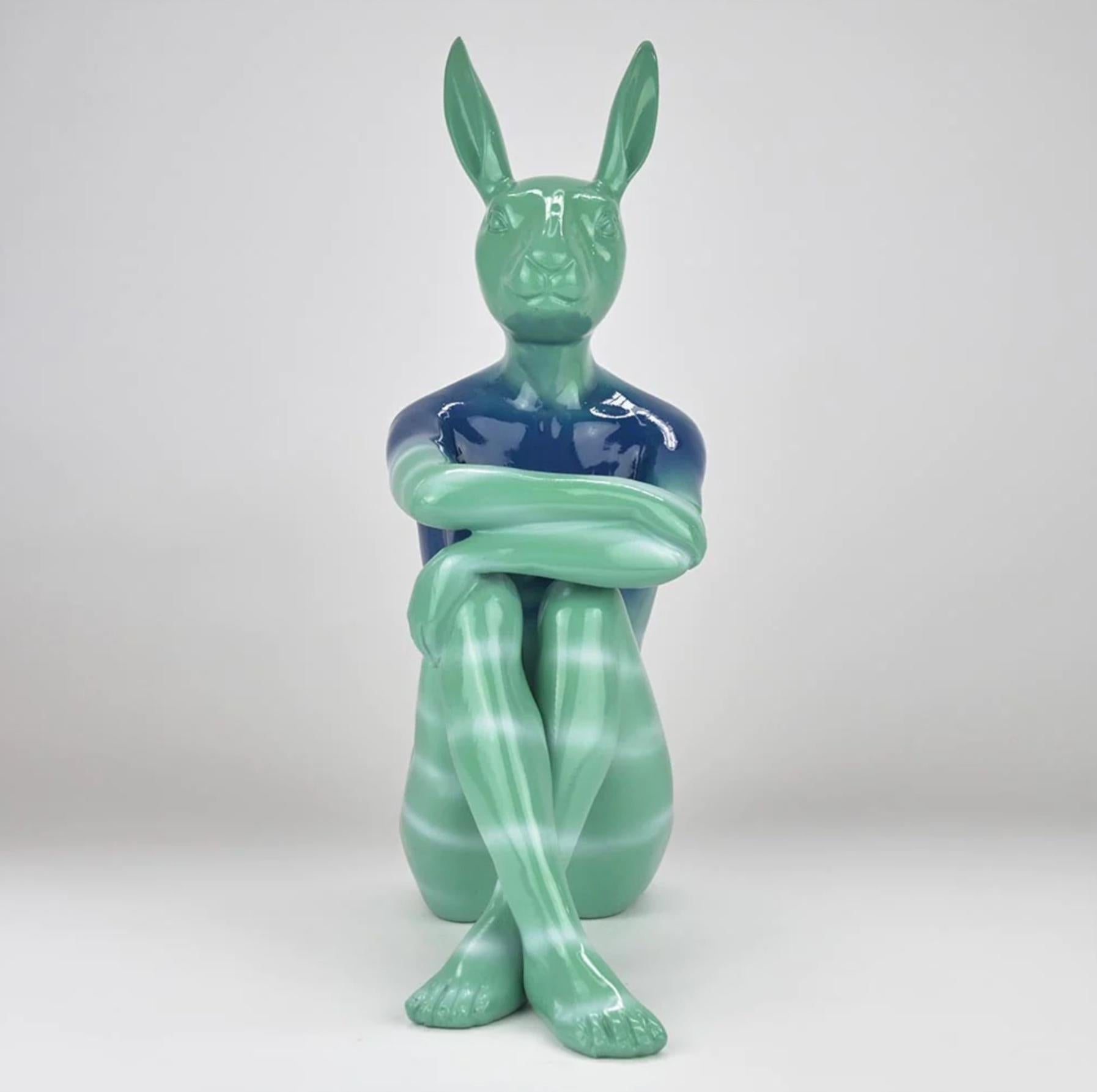 Title: Splash Pop City Bunny (Ocean Blues)
Authentic Resin Sculpture

This authentic bronze sculpture titled 'Splash Pop City Bunny' in Ocean Blues Style by artists Gillie and Marc has been meticulously crafted in resin. This sculpture features
