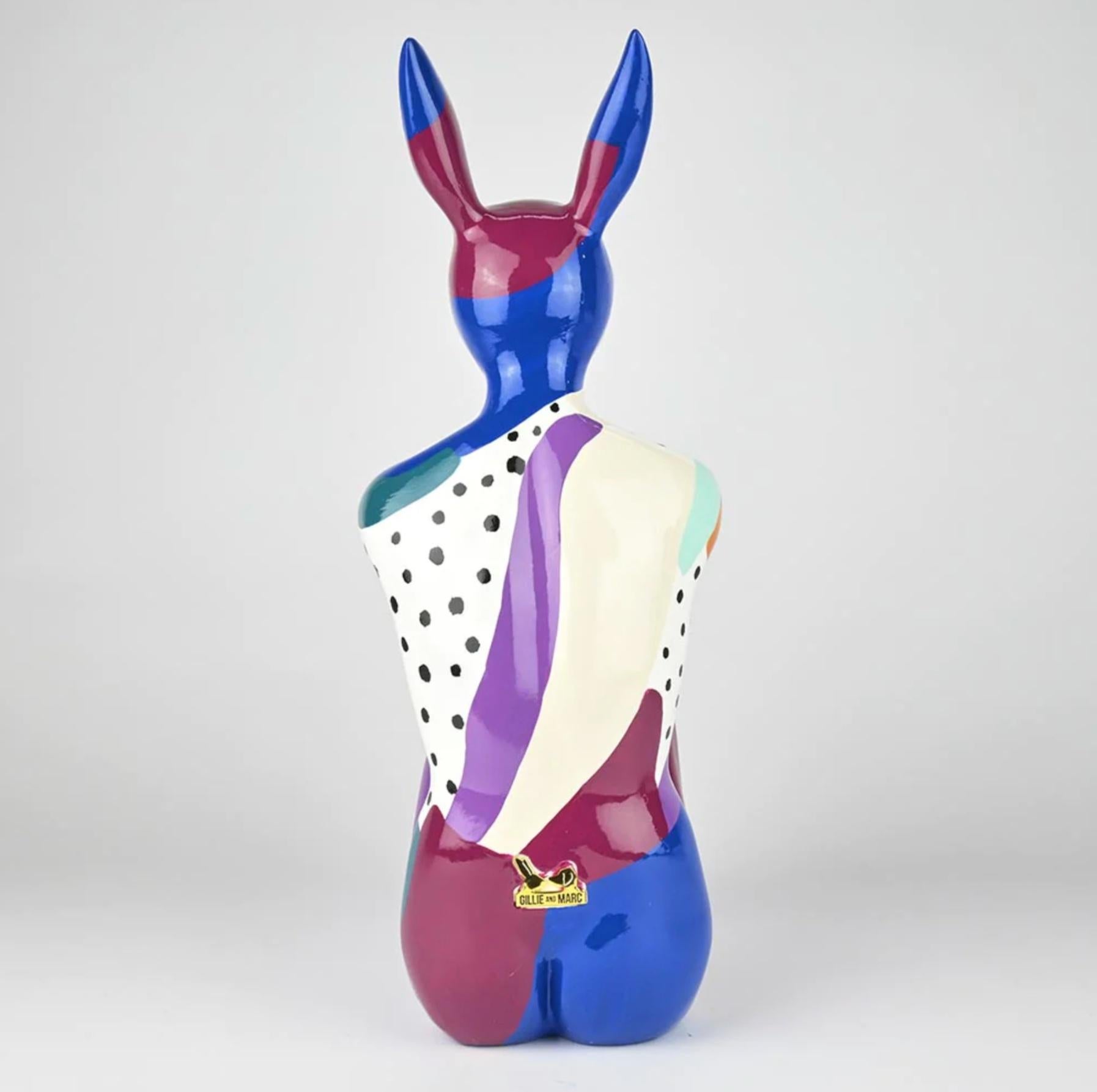 Title: Splash Pop City Bunny (Rainy Forest Days)
Authentic Resin Sculpture

This authentic bronze sculpture titled 'Splash Pop City Bunny' in Rainy Forest Days by artists Gillie and Marc has been meticulously crafted in resin. This sculpture