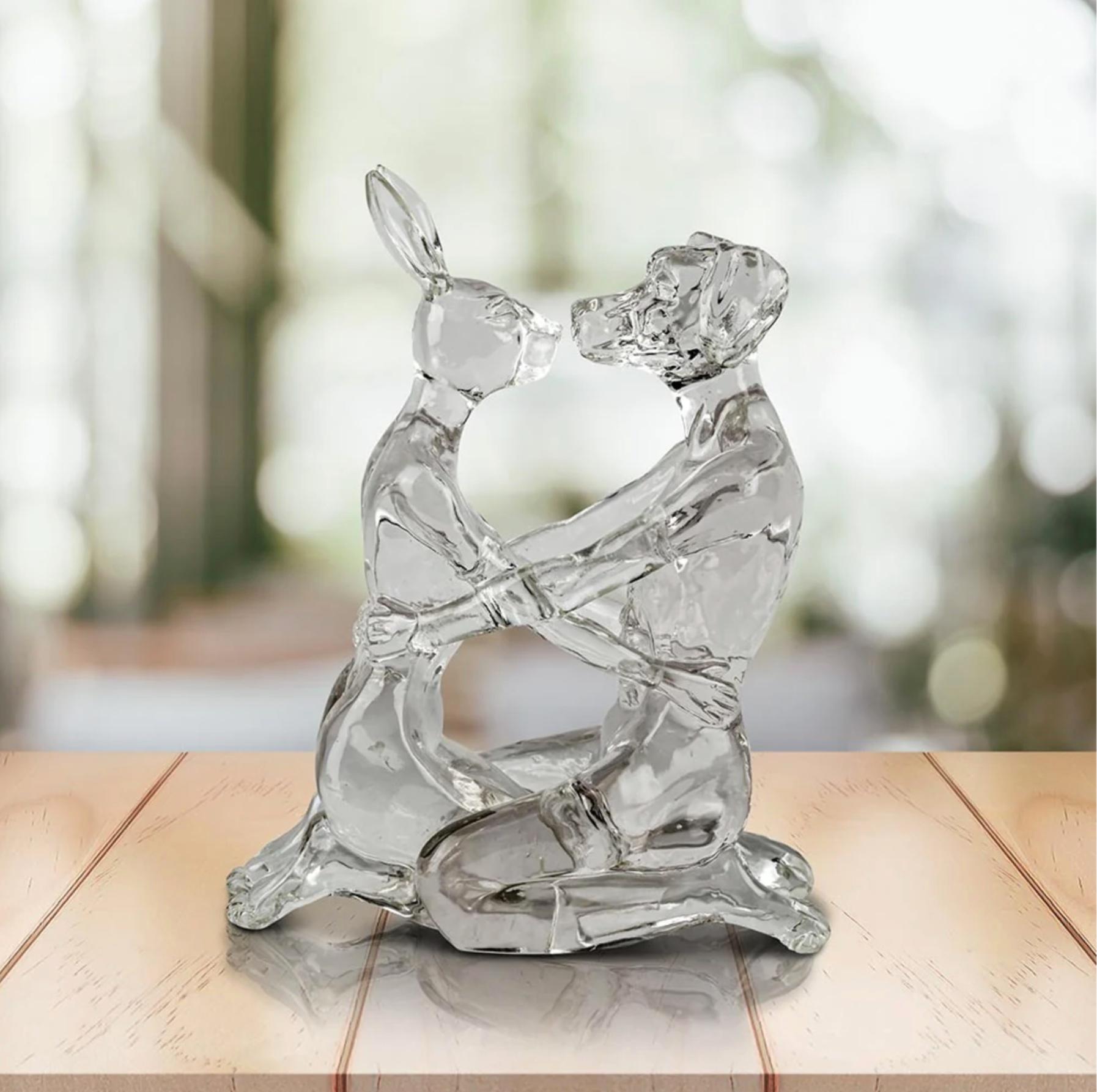 Title: They Were the Best Lolly Kissers (Clear)
Authentic Resin Sculpture

This authentic bronze sculpture titled 'They Were the Best Lolly Kissers' in Clear by artists Gillie and Marc has been meticulously crafted in resin. This sculpture features