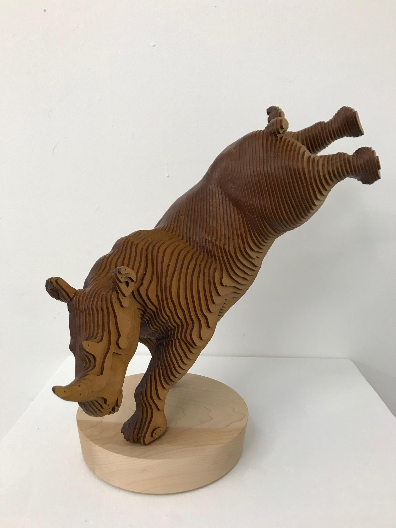 Olivier Duhamel Still-Life Sculpture - Ballerhino..Contemporary whimsical animal sculpture, wood slices, dancing rhino