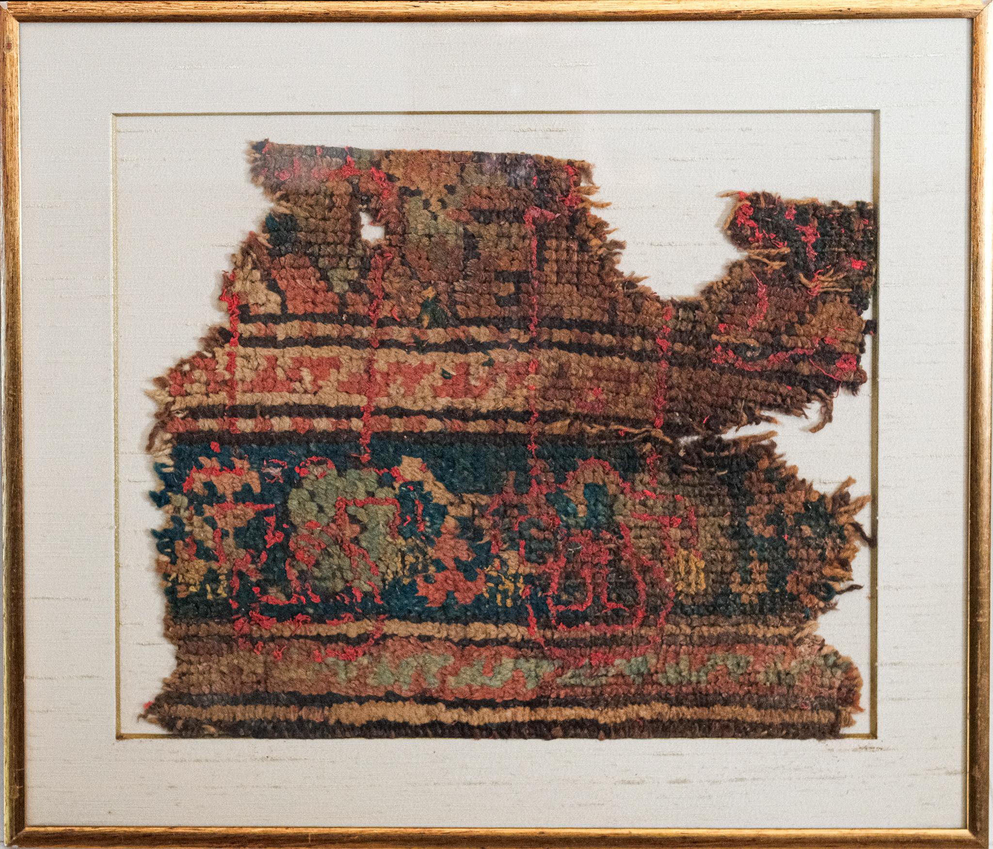 Fragment size: 12 x 15 in.
Frame size: 18 x 21 in.

A 4th to 7th Century Coptic Egyptian antique textile fragment of hand woven wool.  

In the 4th century AD, Greeks invaded Egypt and introduced flocks of sheep producing wool  textiles and enabling