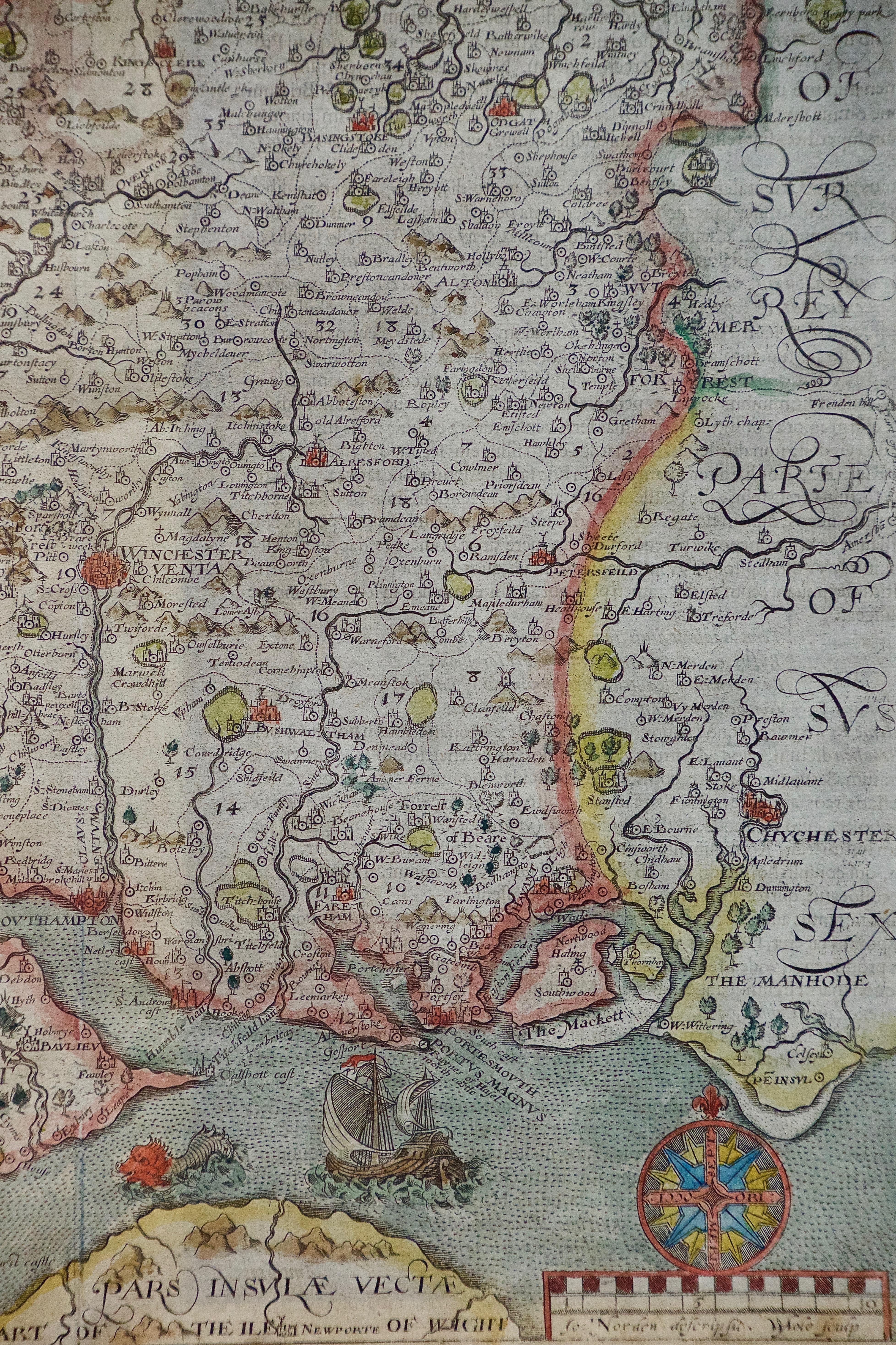 An early hand-colored map of Britain's Hampshire county, published in the 1607 edition of William Camden's great historical description of the British Isles, 
