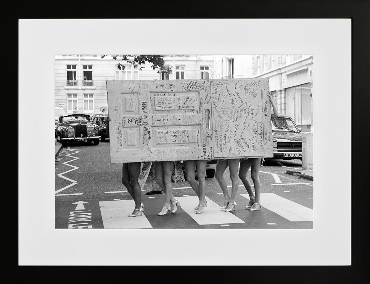 The Beatle's Original Apple Studio Door with Legs, Savile Row, London, 1982 - Photograph by Richard Young