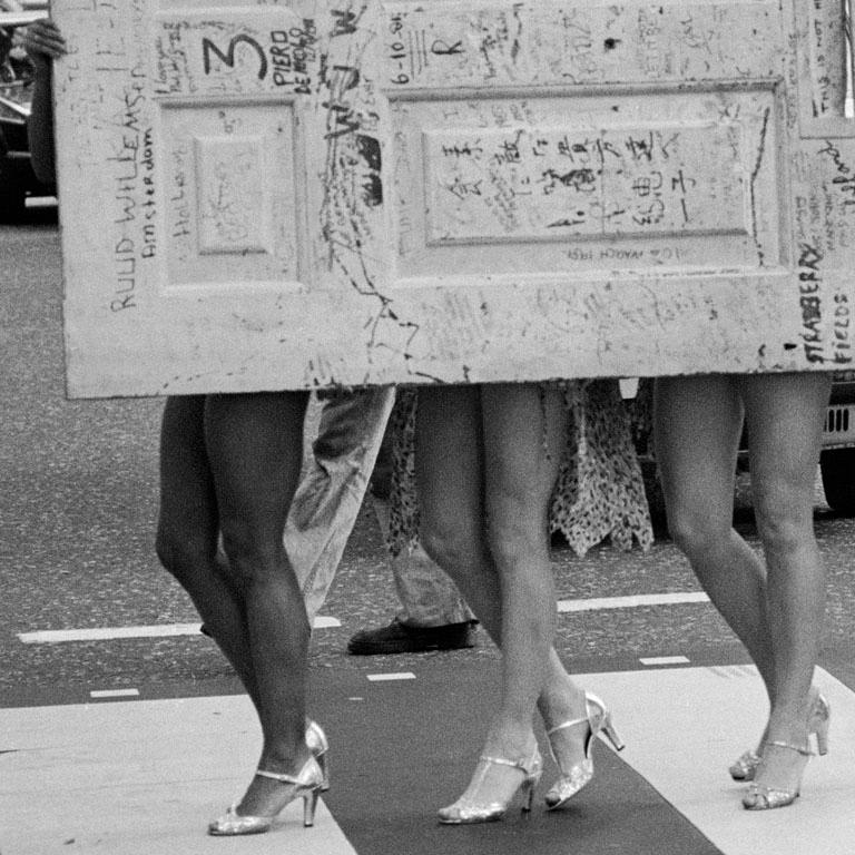 The Beatle's Original Apple Studio Door with Legs, Savile Row, London, 1982 - Gray Black and White Photograph by Richard Young