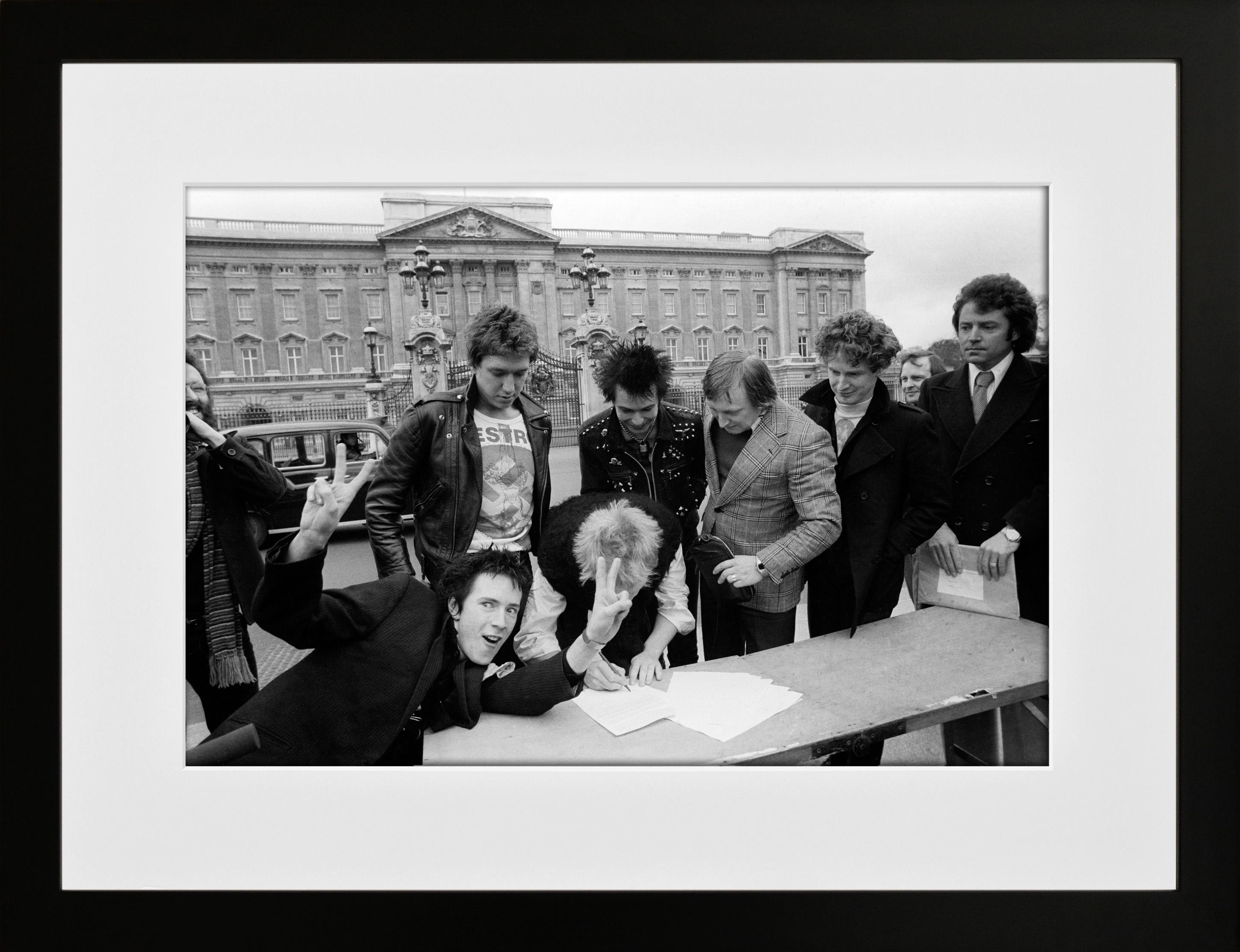 Sex Pistols, Buckingham Palace, London, 1977, Photography - Black Black and White Photograph by Richard Young