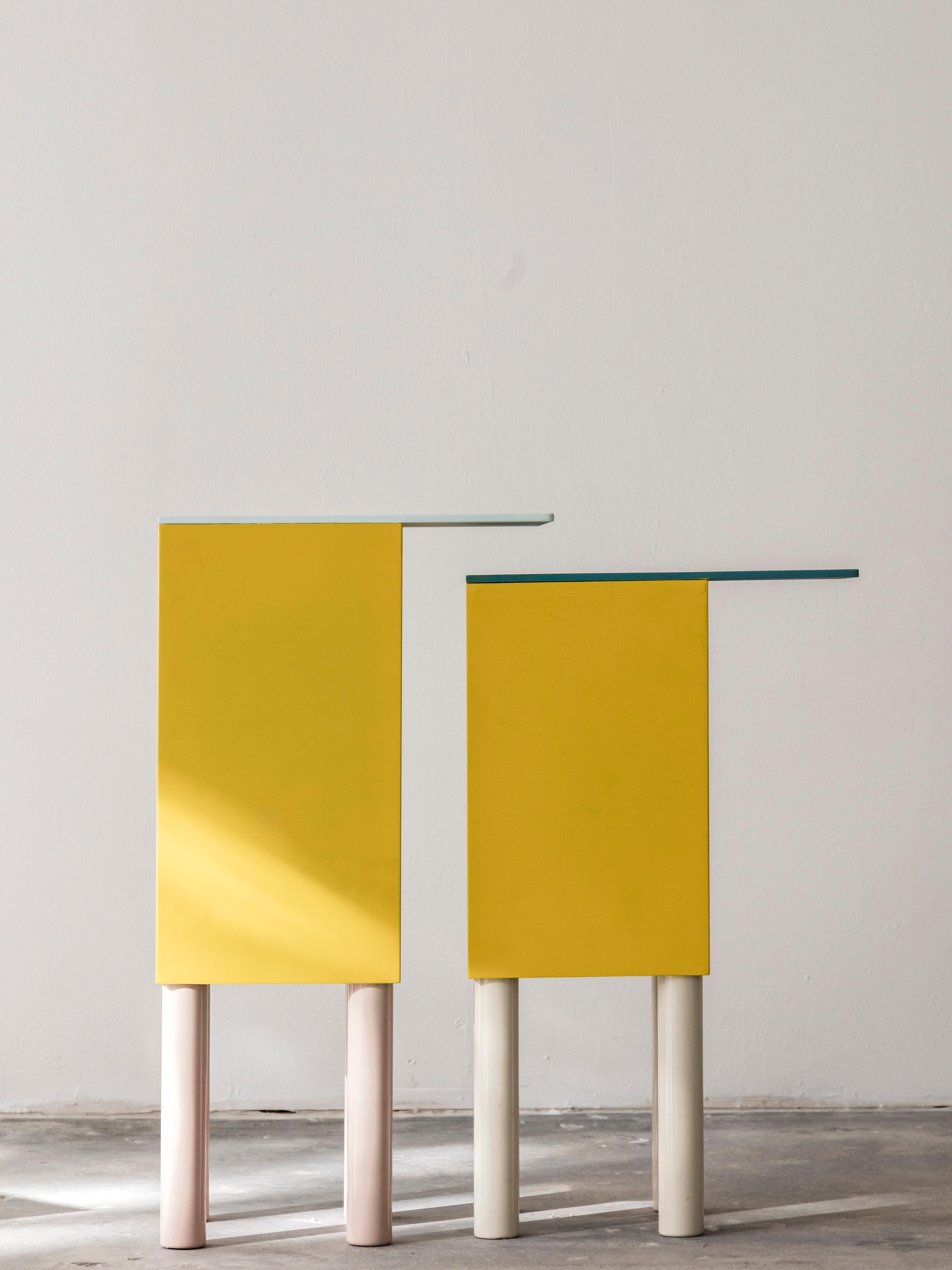 The nested bird like side tables are playful in both color and structure. The tables are made of powder coated aluminum in bright colors. 

