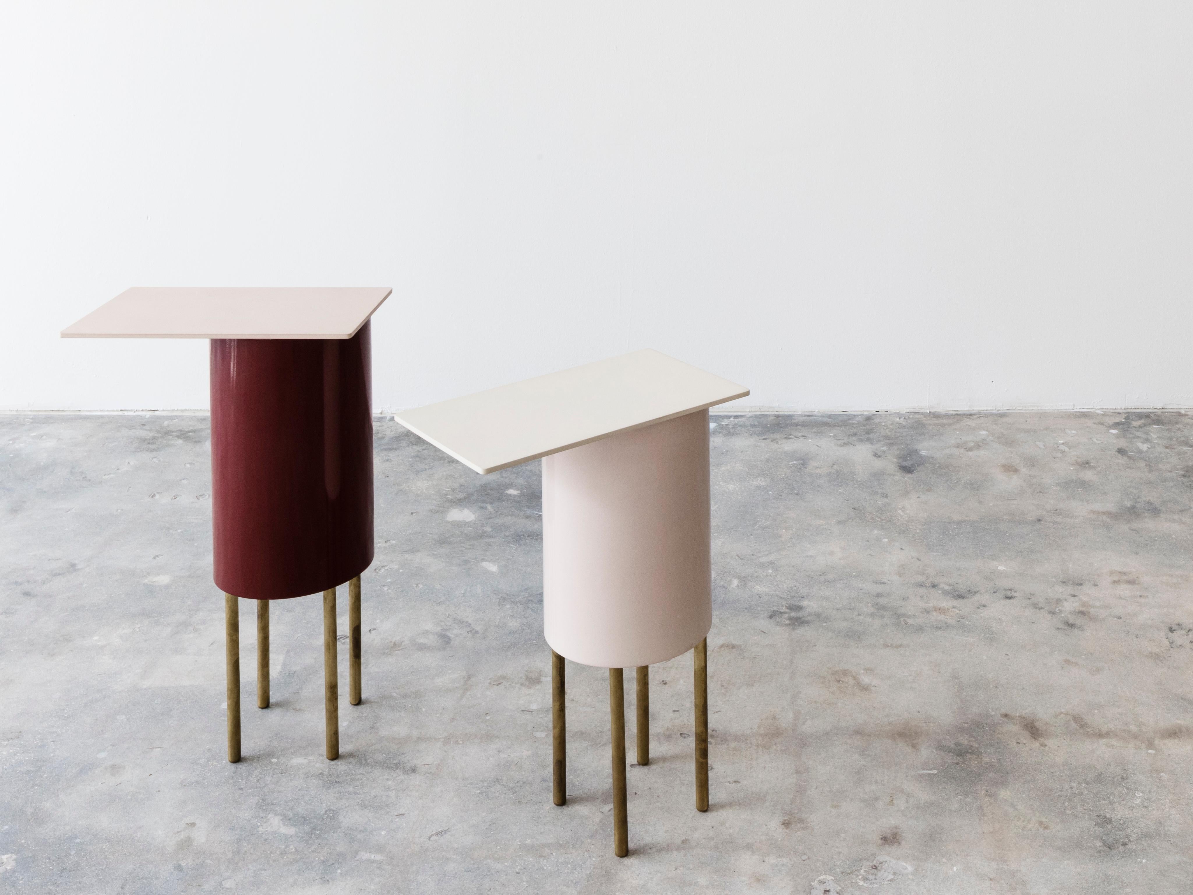 The nested bird like side tables are playful in both color and structure. The tables are made of powder coated aluminum in bright colors.  These side tables feature thin brass legs.

Jonathan Gonzalez (b. 1981) is a Miami based Architect and