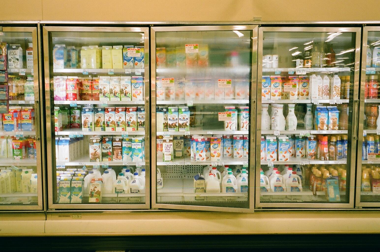 Fernanda Torcida Color Photograph - Color photograph of Supermarket interior, Fogged glass doors and colors 