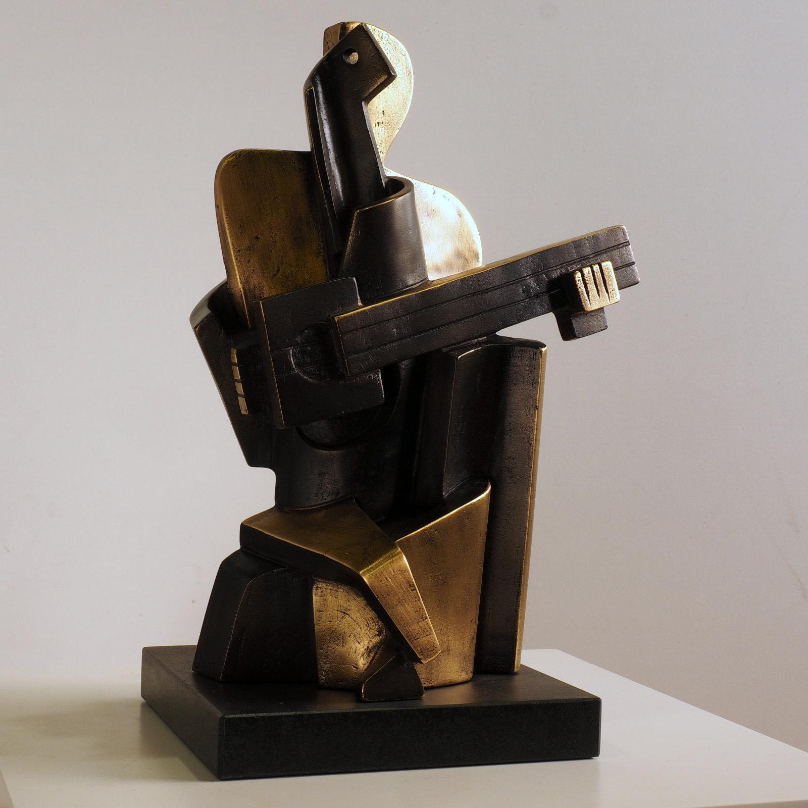 Cubist Sculpture "Big Guitarist Arlequin" by Miguel Guía.
The sculpture is made of a layer of bronze on cold smelting of copper with the base of graphite or marble dust.
Limited edition of 150 works.
The base is included in the price.
The dimensions