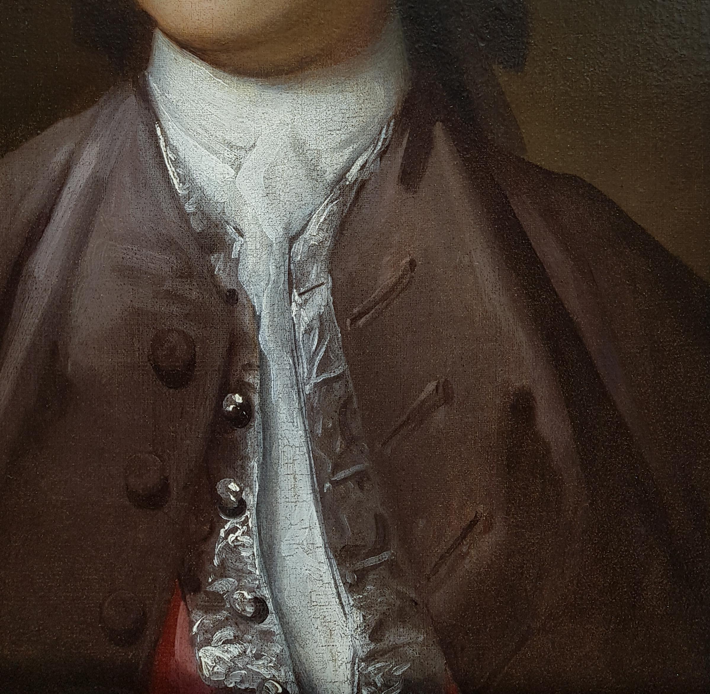 This striking young gentleman has been depicted in a brown coat, a white cravat, and a pink waistcoat with elaborate silver detailing.  In fashionable circles of this period the wig is worn dressed off the face from temple to temple in a low toupet