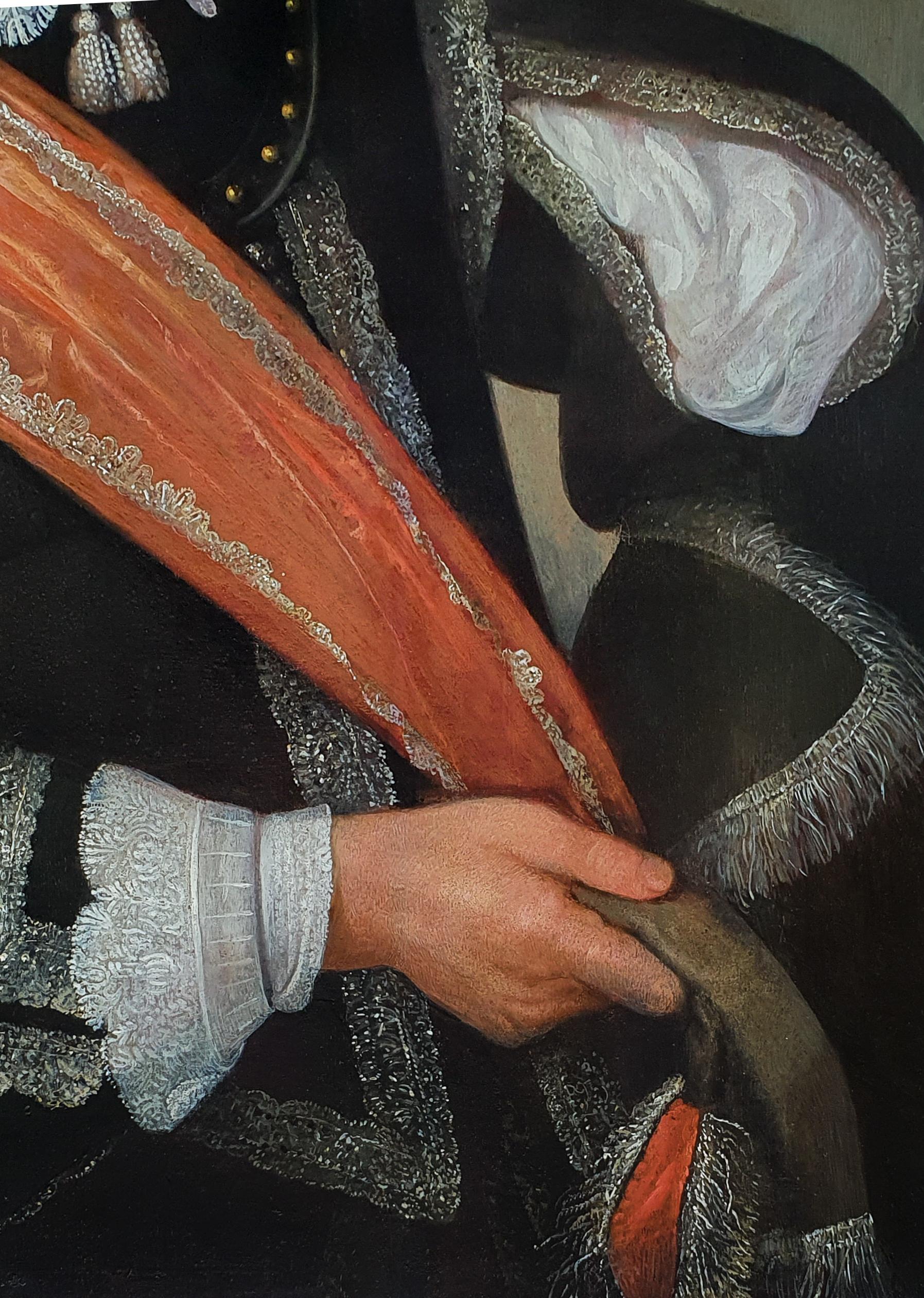 This exquisite oil on panel portrait of a gentleman depicted in a sumptuous black doublet edged with silver and slashed sleeves is an excellent example of the type of portrait fashionable in England and the Low Countries during the 17th century. 