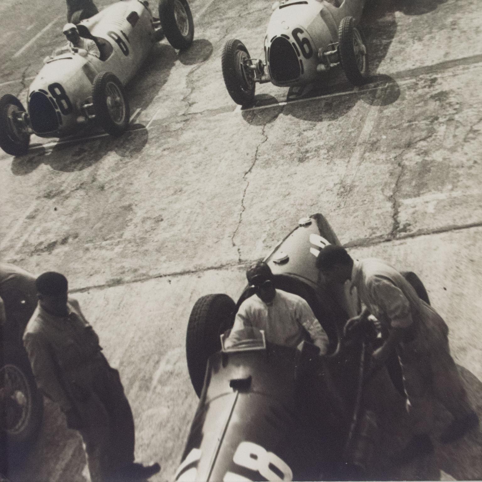 An original silver gelatin black and white photograph by Lauro Bordin, Milano - Departure of the car race in Monza, Italy, 1936.
Features:
Original Silver Gelatin Print Photograph framed
Press Photograph
Press Agency: Anonymous
Photographer: Lauro