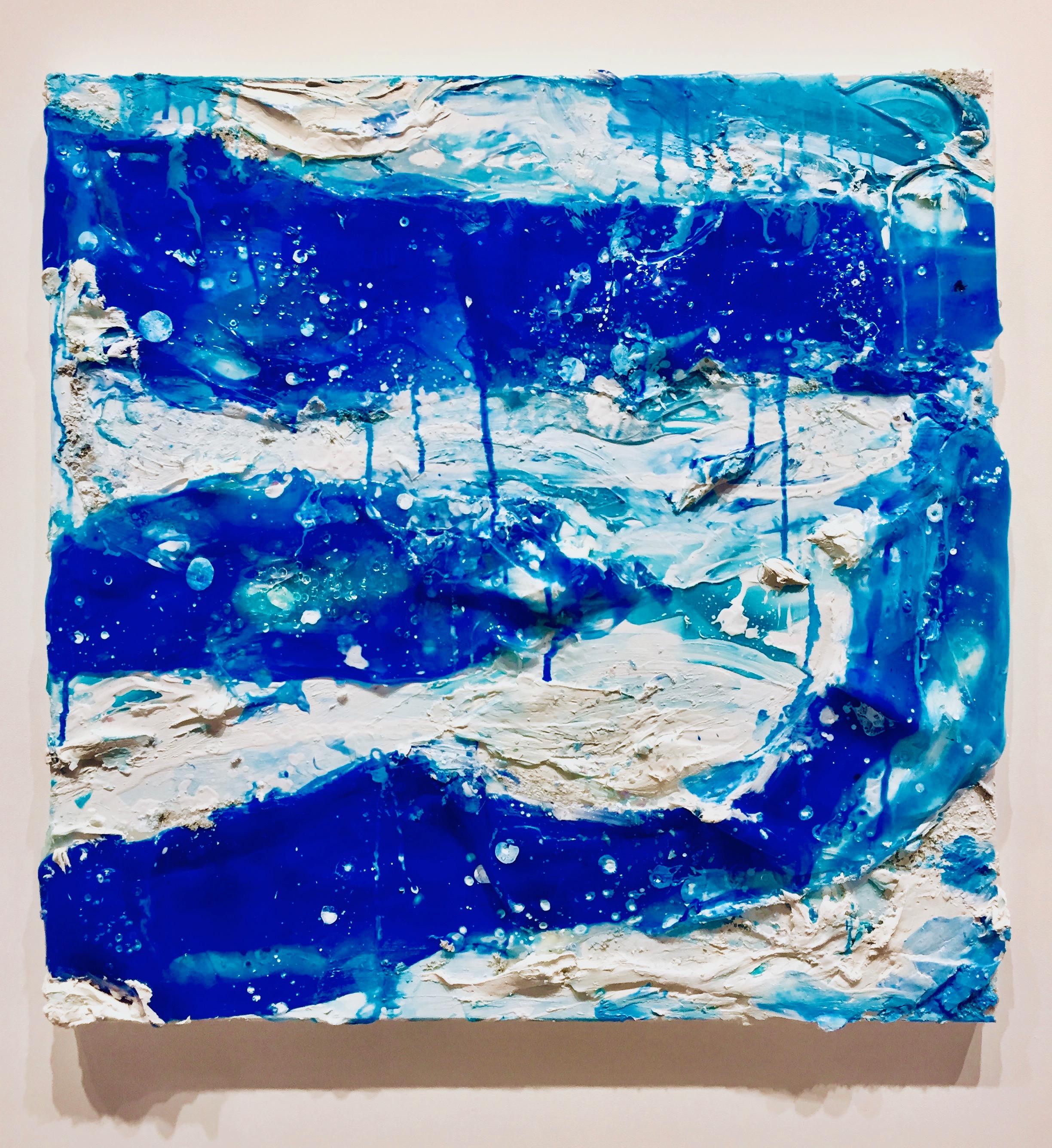 This painting is part of a series of 4 square paintings created in 2018, a laboratory for investigating the color blue, created by collaging with acrylic paint skins and other material that create texture. They were inspired by the ocean.