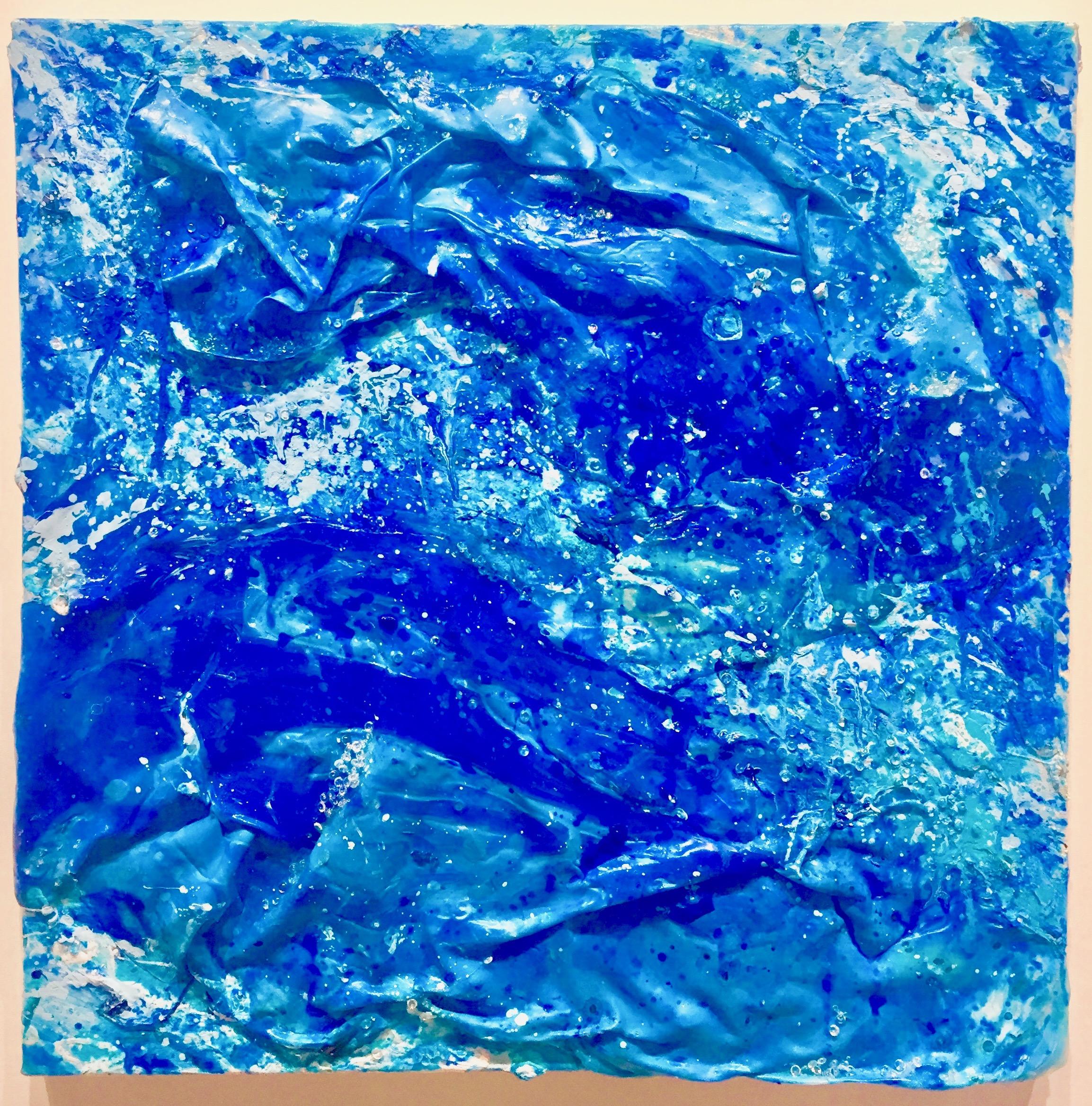 This is part of a series of 4 square paintings created in 2018, a laboratory for investigating the color blue, created by collaging with acrylic paint skins and other material that create texture. They were inspired by the ocean.