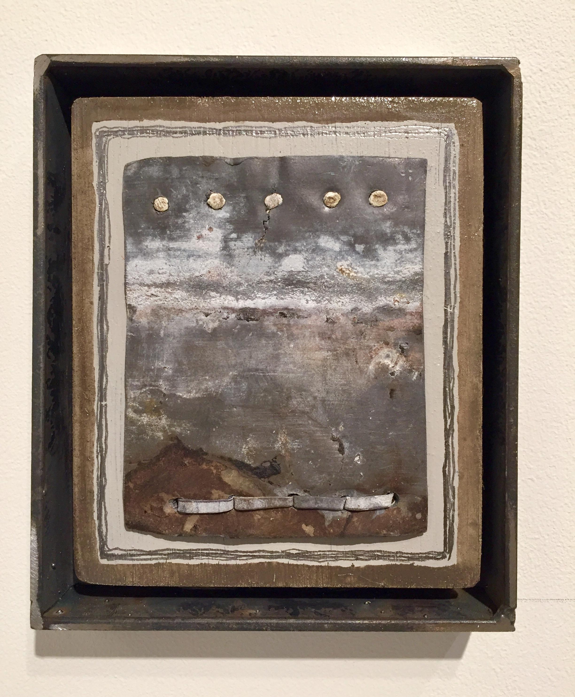 A small wall sculpture representing a panoramic landscape were the earth's surface and thy sky appear to meet, it is not a replication of a particular observation but simple in form, tactile in material and compact in scale, it's the artist's intent