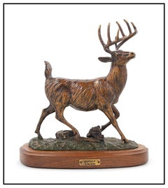 Sculpture en bronze de Carl Wagner représentant une faune signée Wildlife Full Round Tailin Animal Art