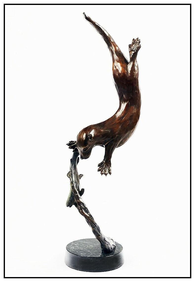 bronze otter sculpture