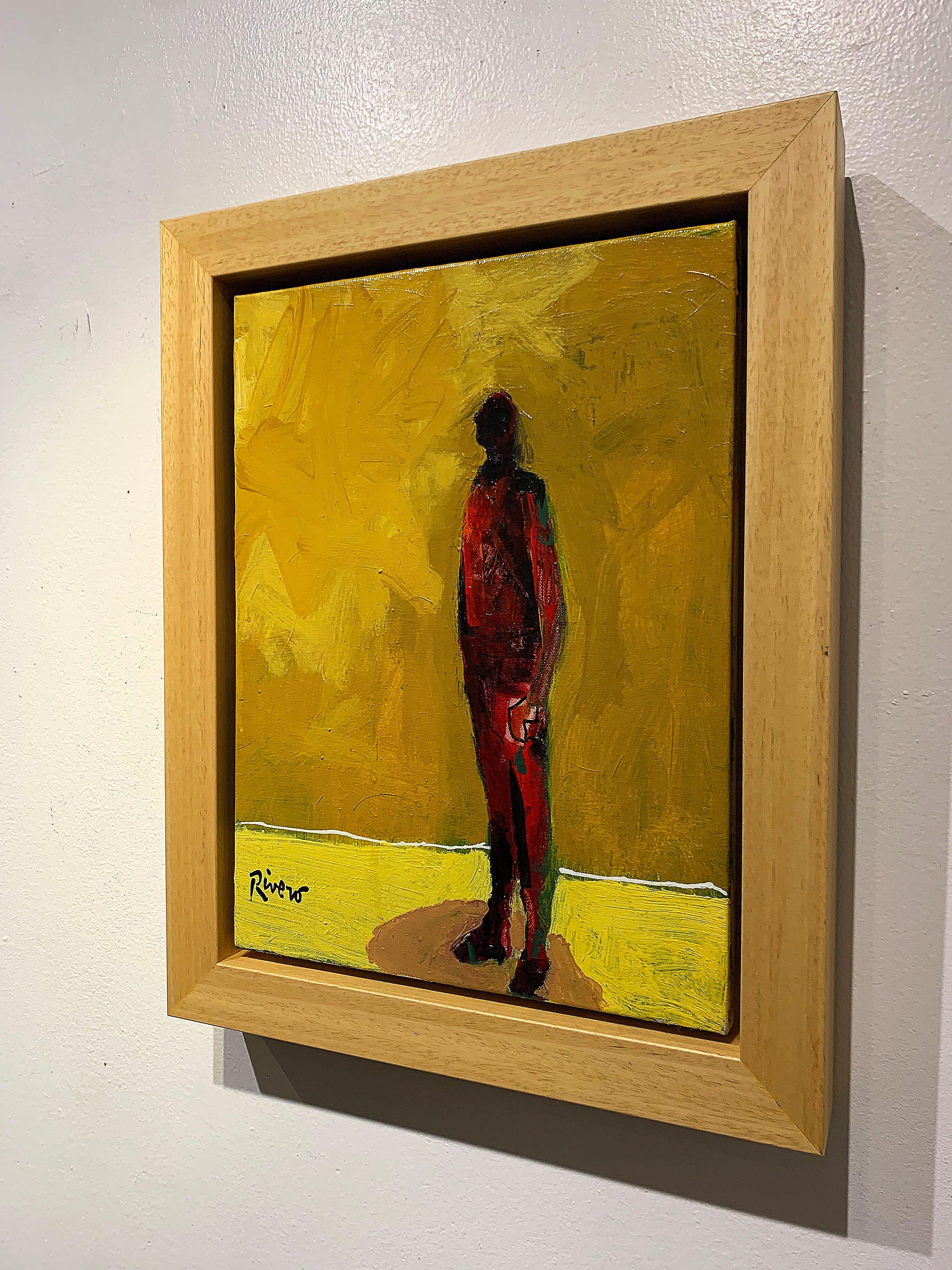 man standing painting