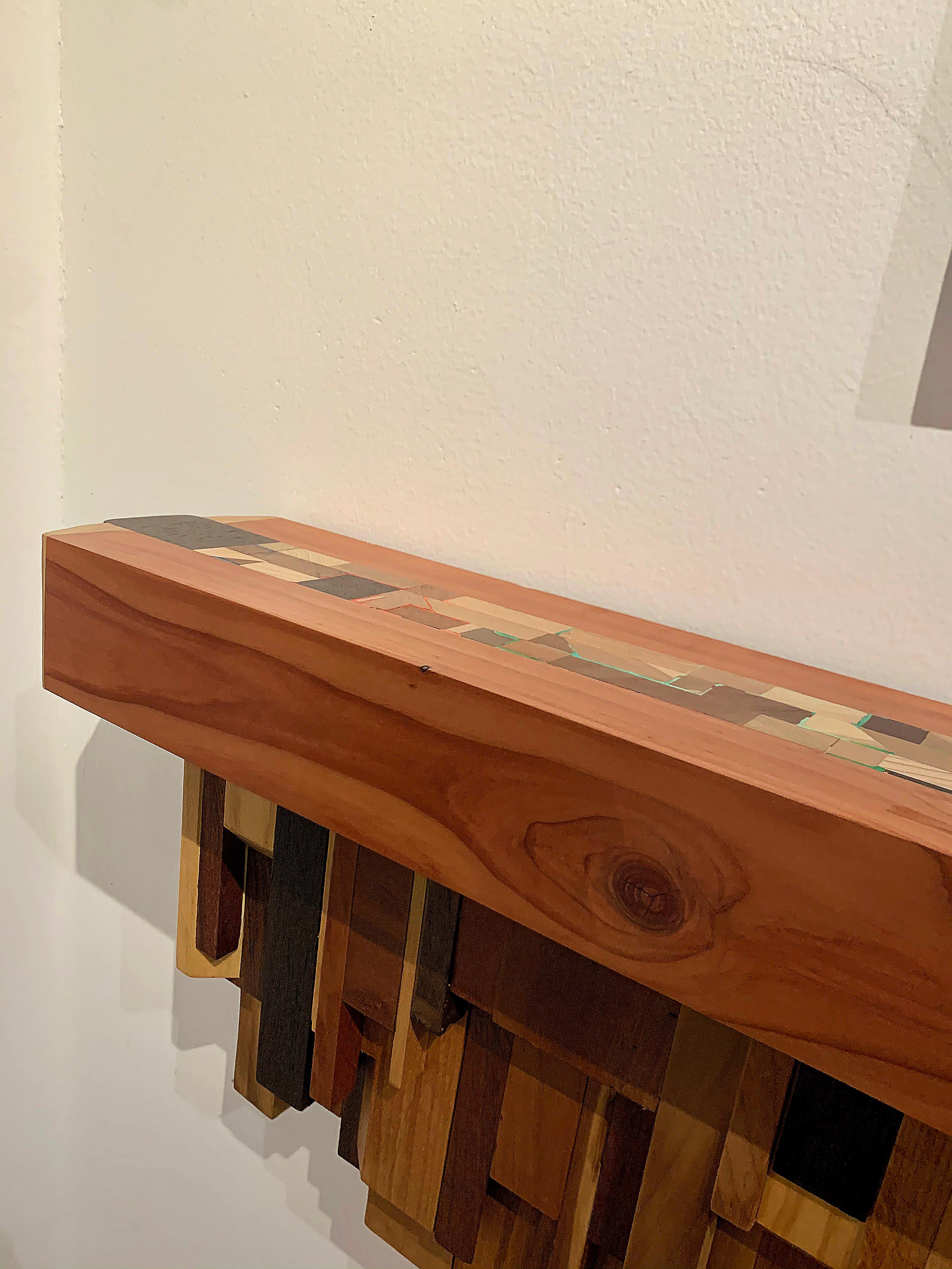 Artful one-of-a-kind long shelf or sculpture by artist Ben Darby. Made of various pieces of wood and accented with multi-color acrylic paint. We selected this piece soon after it was completed and as with many of Darby's artwork, this piece is a