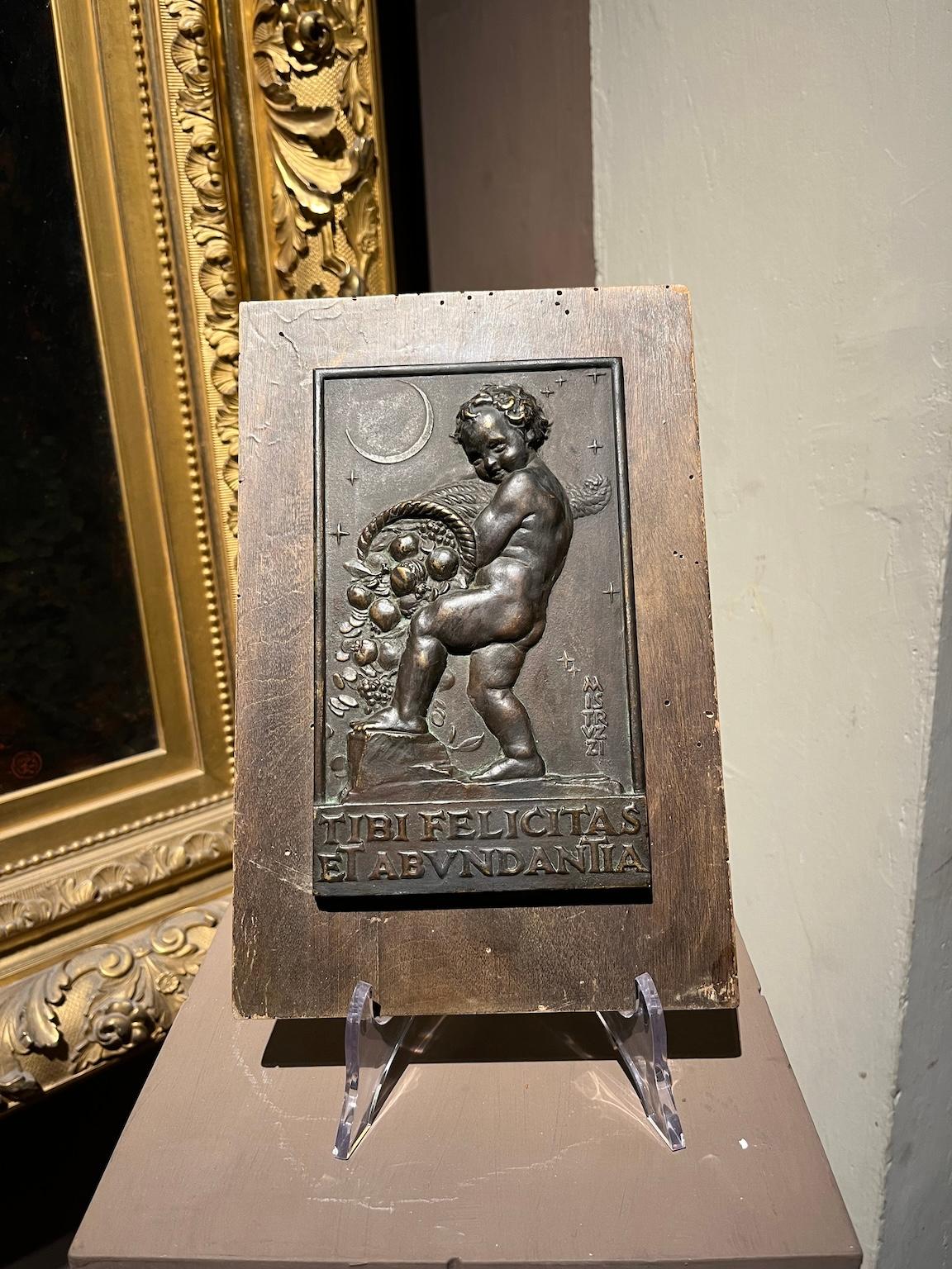 Allegorical bas-relief in bronze and wood with putto and cornucopia For Sale 4
