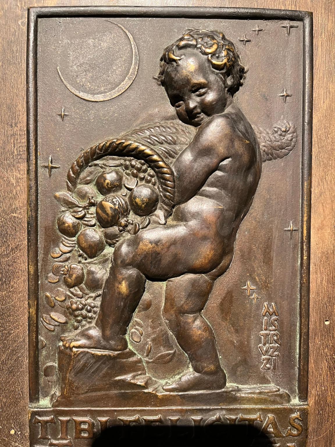 Allegorical bas-relief in bronze and wood with putto and cornucopia For Sale 1