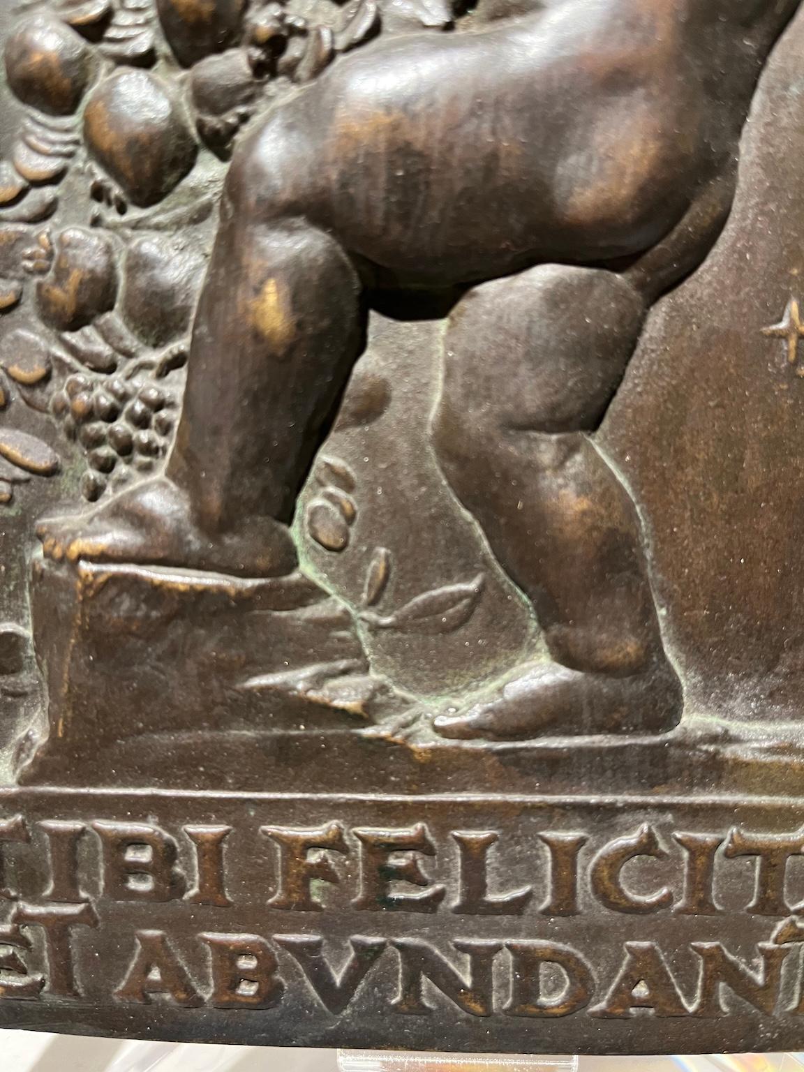 Allegorical bas-relief in bronze and wood with putto and cornucopia For Sale 1