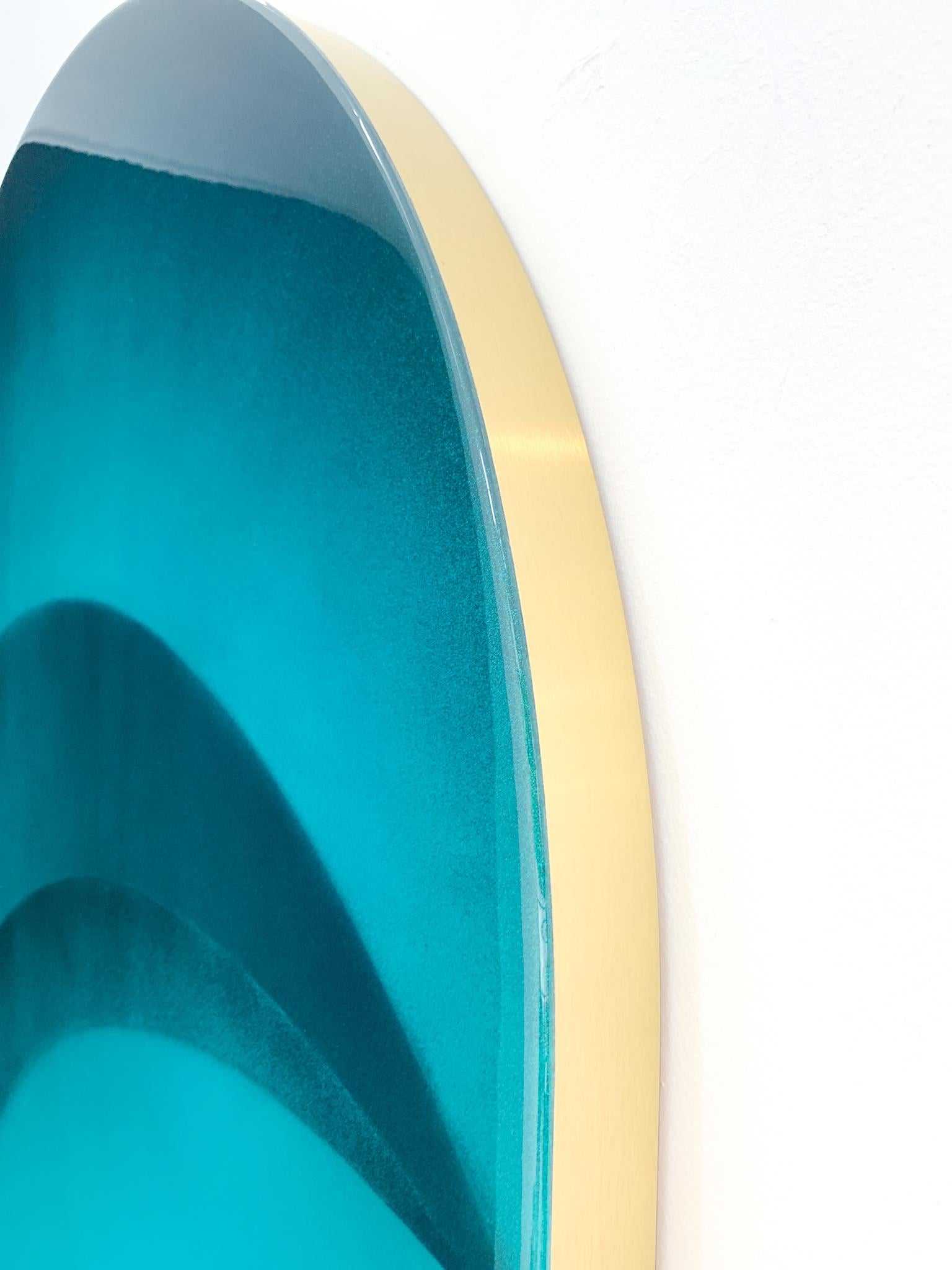 Corine van Voorbergen is an intuitive artist. Through her minimalistic round art forms she focusses on the idea of eternal movement. In her current series 'Through the Brass Eye of the Beholder' she evokes a certain feeling in the viewer through her
