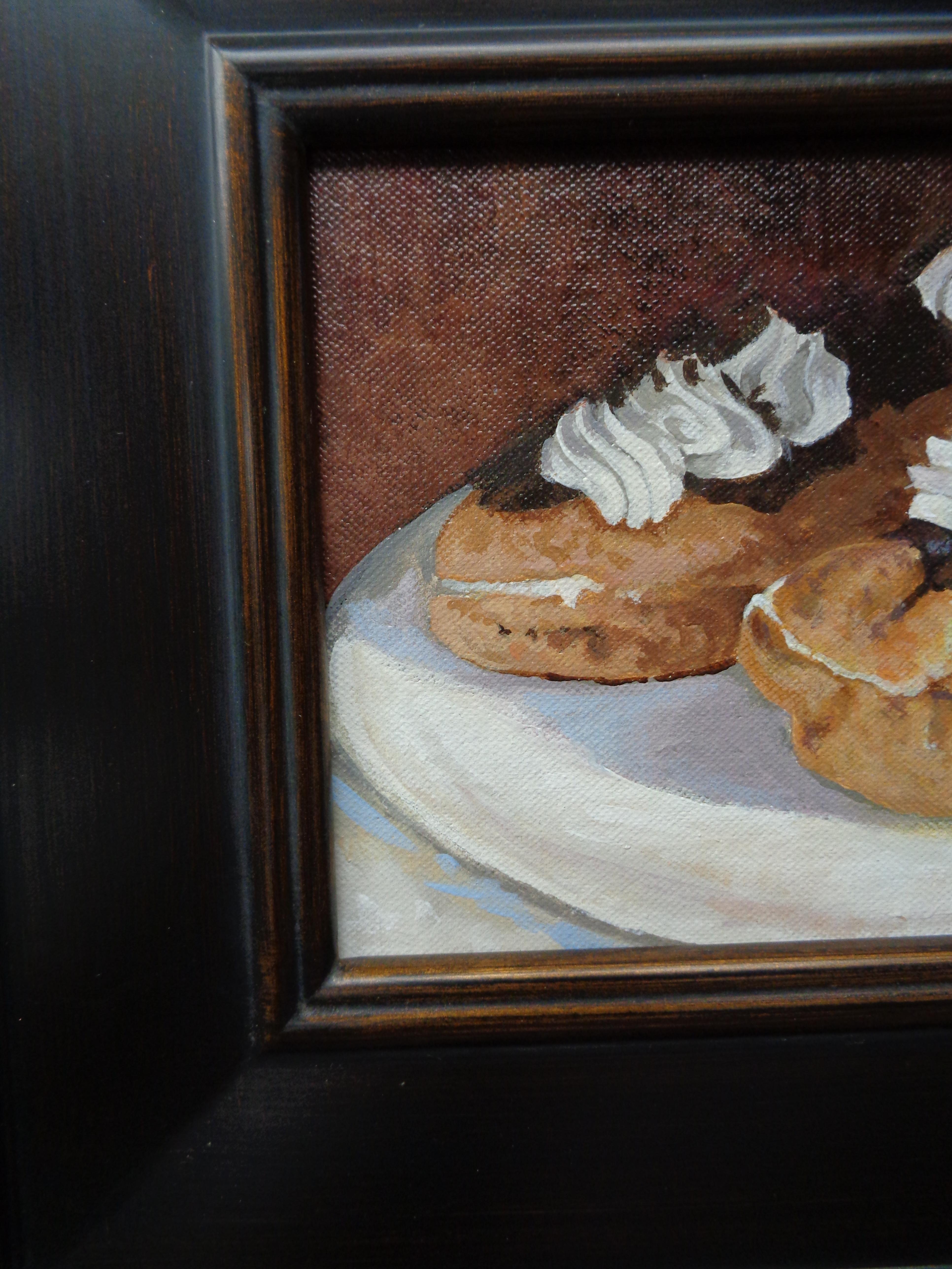 An oil painting on canvas by award winning contemporary artist Michael Budden that showcases a pair of eclairs. Image is 6 x 8 unframed.
ARTIST'S STATEMENT
I have been in the art business as an artist and dealer since the early 80's. Almost 40 years