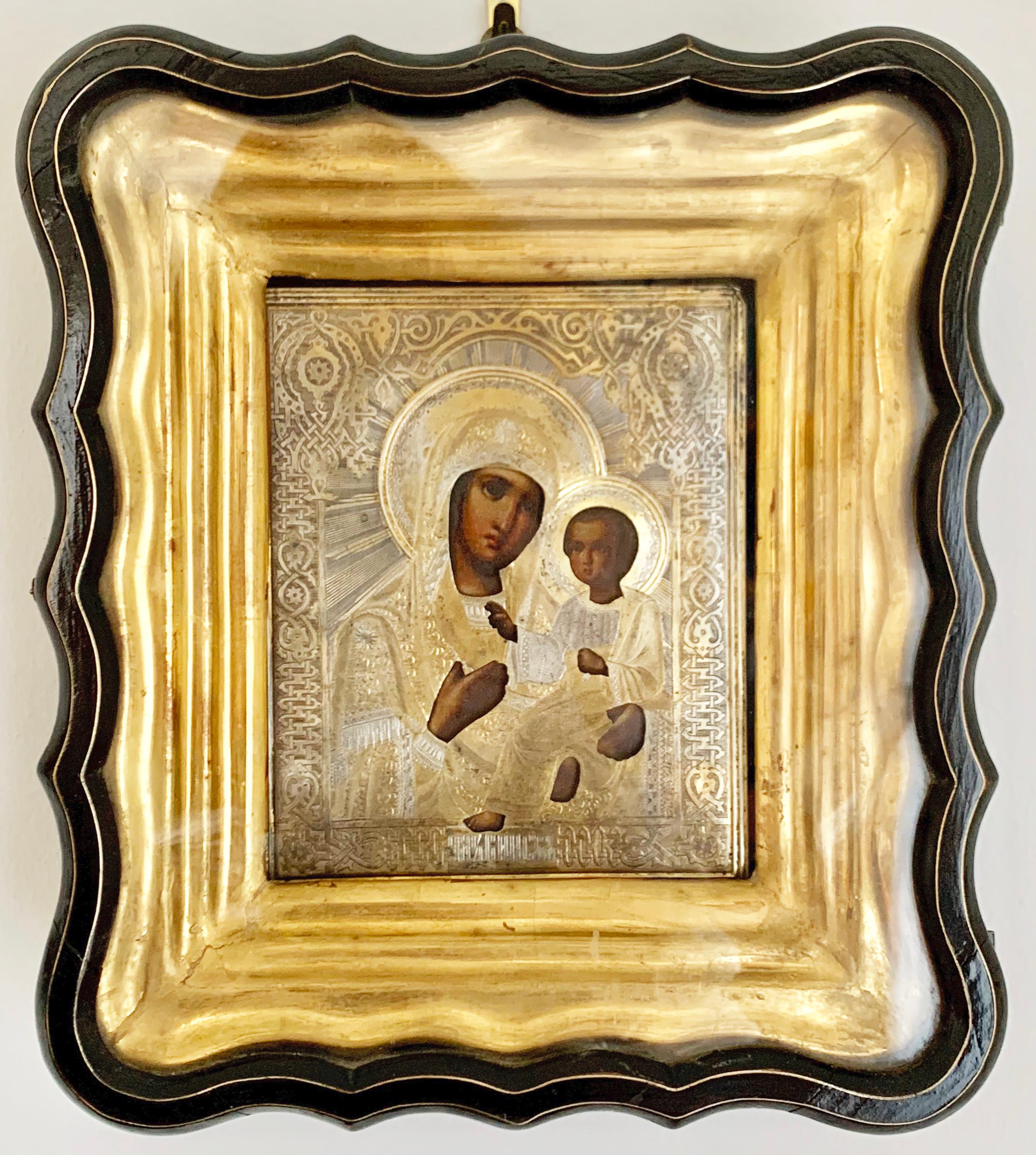 "Virgin Mary and Child", Russian Imperial gilted silver oaklad icon in kiot - Art by Unknown