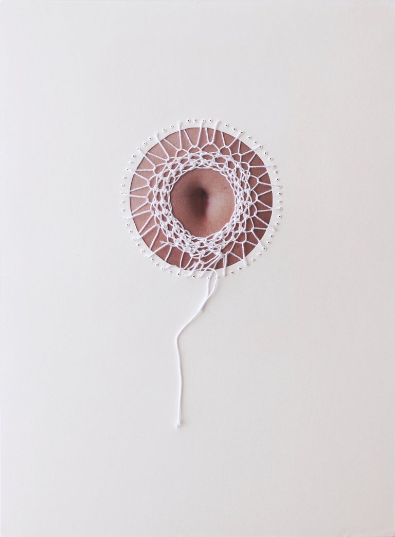 "Zaffo No 9" (Aperture #9) by contemporary Italian artist Camilla Marinoni is a mixed media piece with paper, cotton thread crochet embroidery, and photography. The artwork is one in a series of a hundred pieces created in 2018 and exhibited in 2019