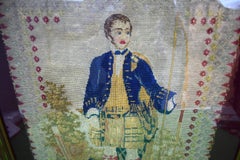 Panneau de broderie victorien du 19e siècle représentant un chasseur écossais signé J