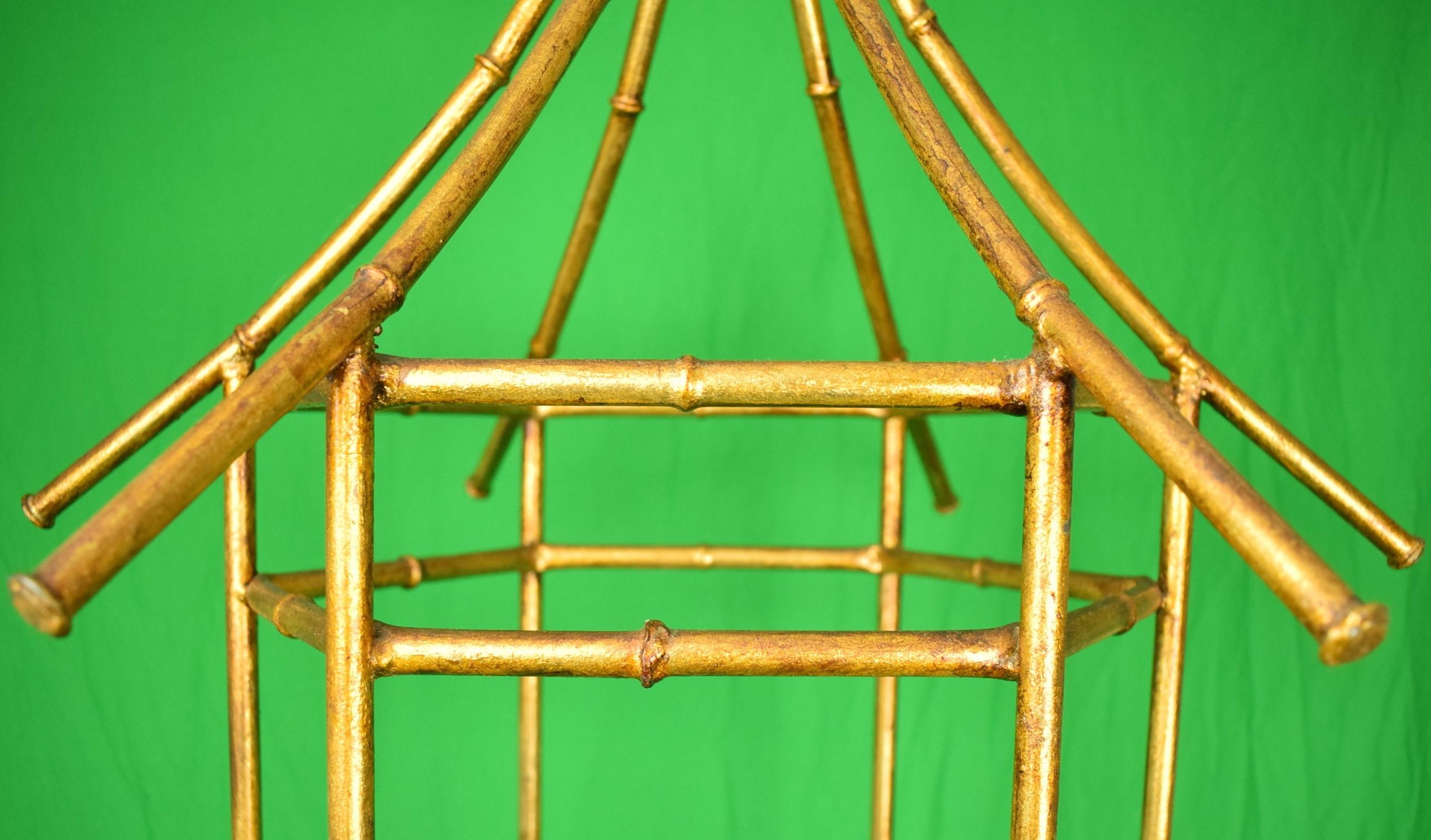 Vintage brass bamboo three glass tier etagere

Sz: 62 1/4