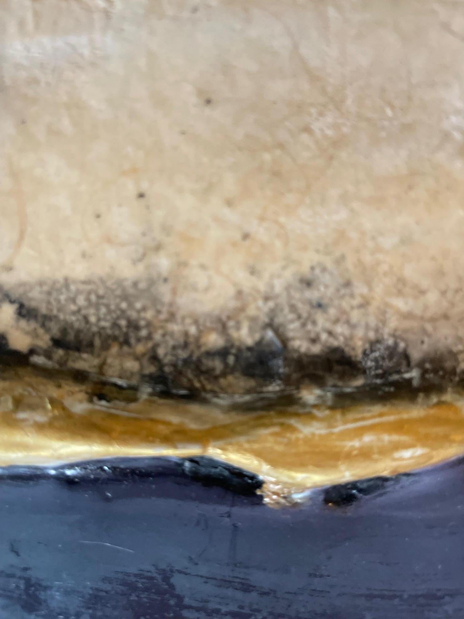 Encaustic Art is a kind that touches the the viewer with raw emotion.
This work by Midland, Michigan artis Fletcher Dean comes with advice from the artist himself on the back to protect your artwork:
