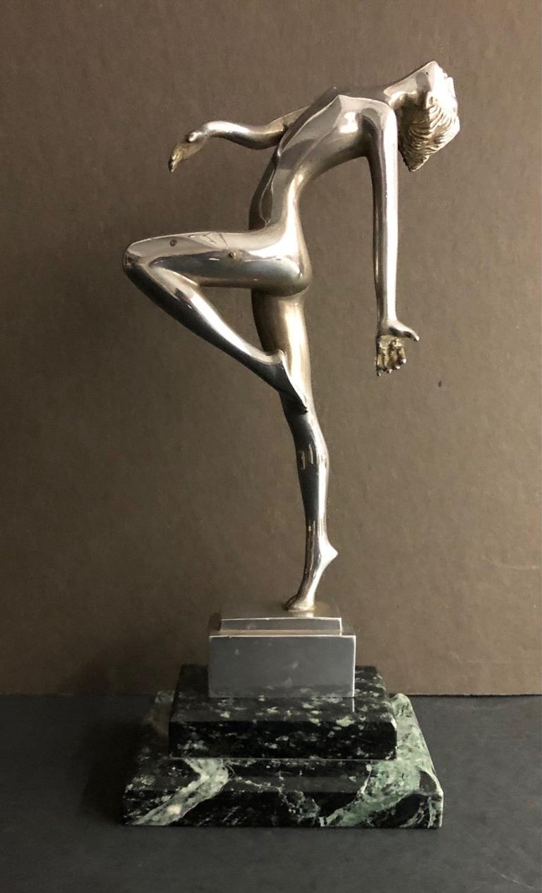 (Title Unknown) Silver Dancing Female Nude on a Green and Black Marble Base - Art by Unknown
