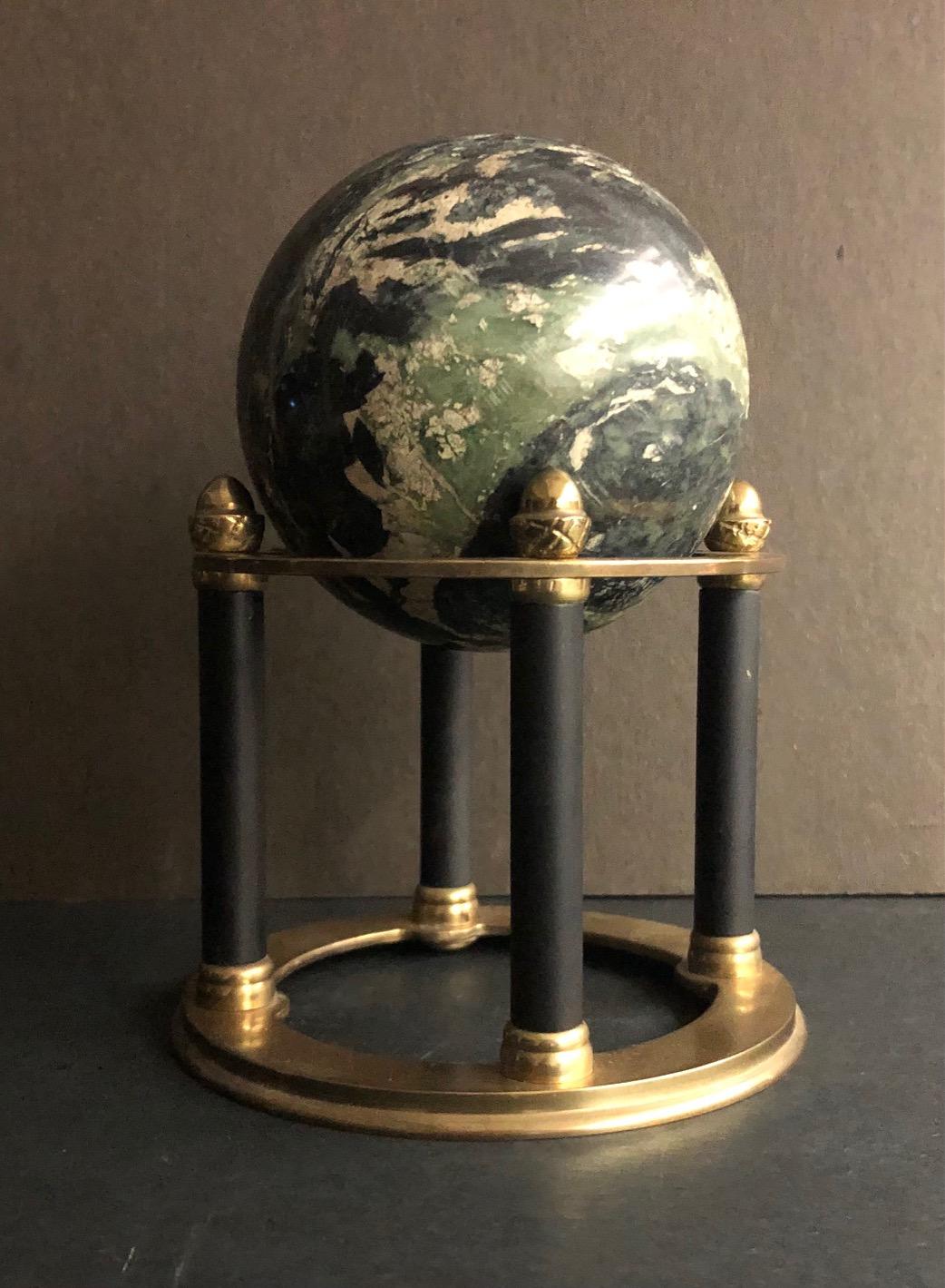 Green Marble Sphere on Black and Gold Base - Art by Unknown