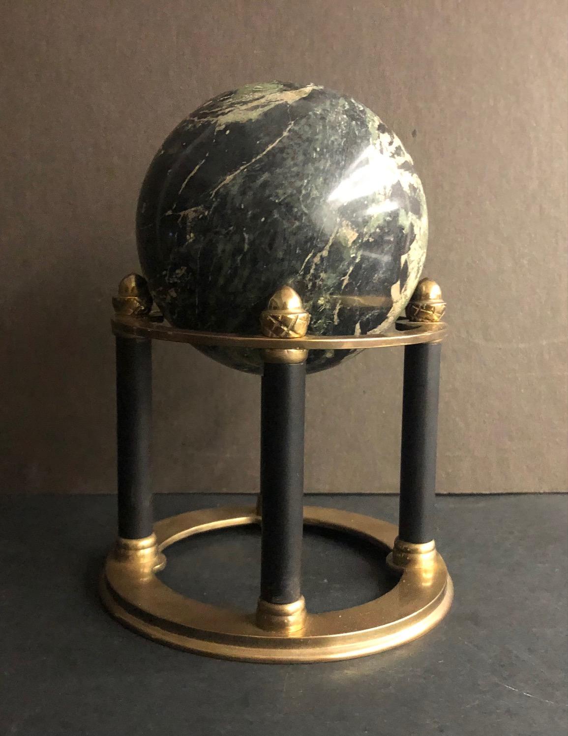 Sphere on stand measures approximately 7.5 x 4.5 inches. Sphere measures approximately 4 x 3 inches. Good Condition. The date of creation is unknown, but is believed to be within the Early-Mid 20th Century. 