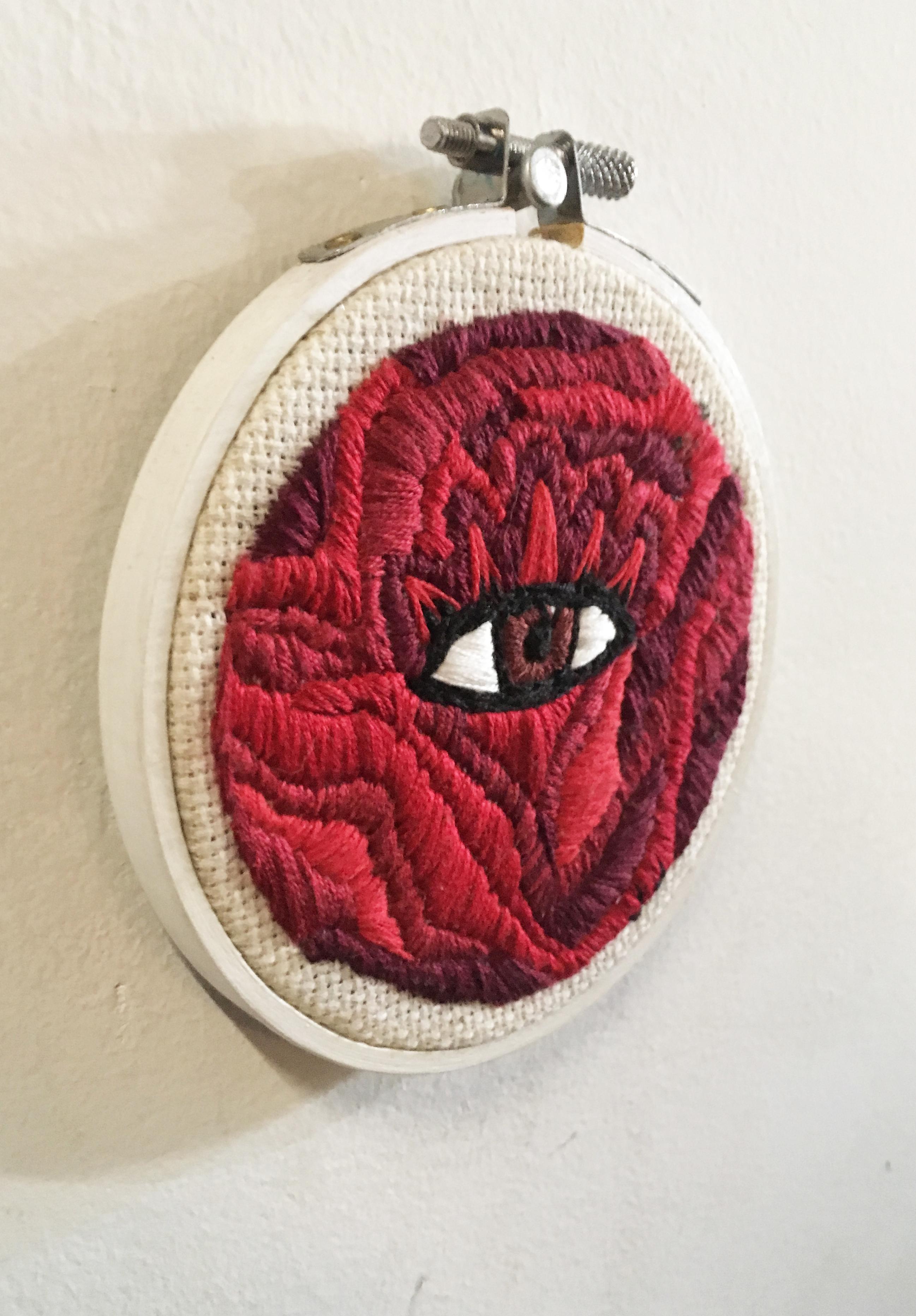 Embroidery in wood hoop
