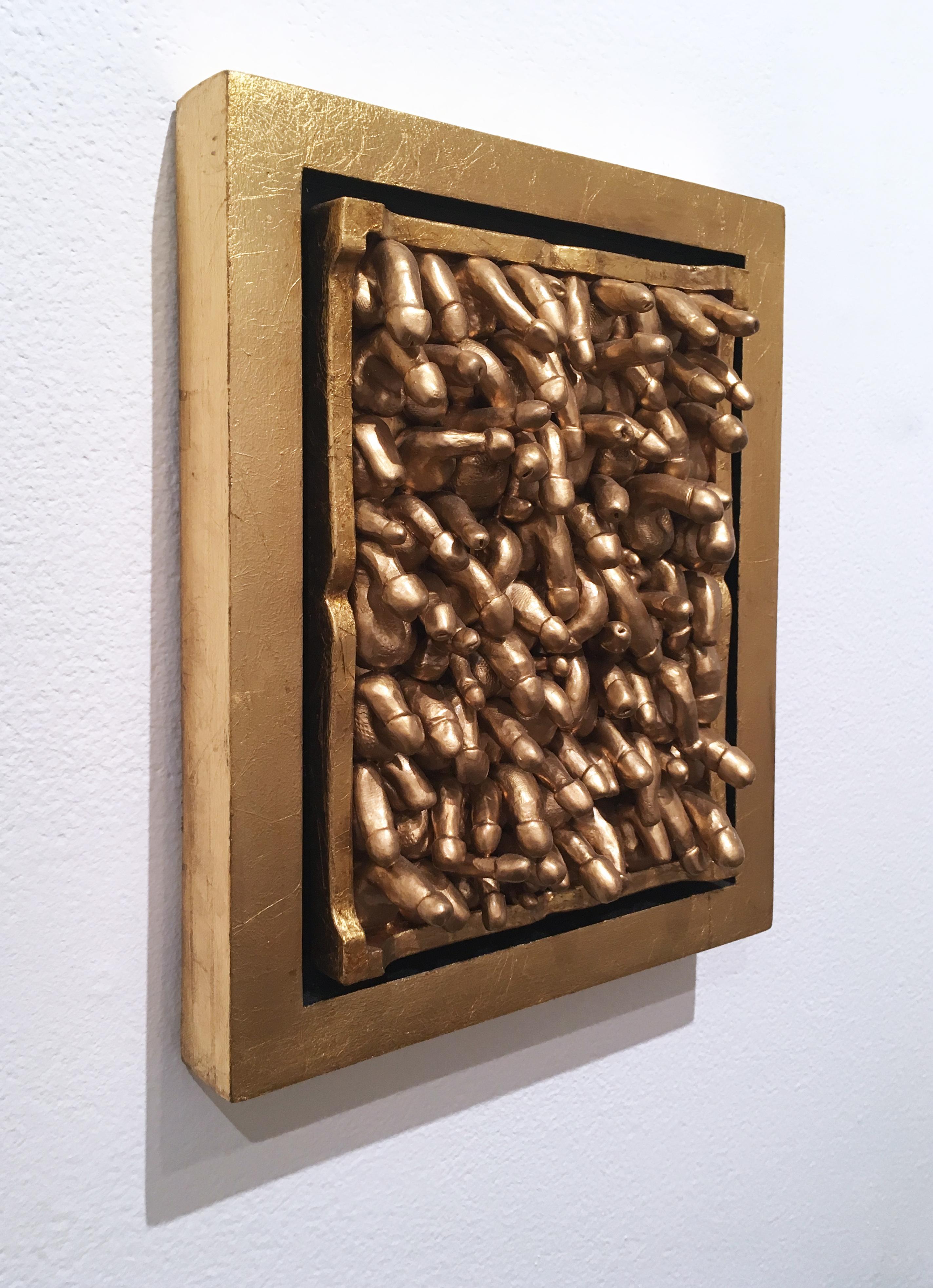 Clay, ceramic, gold leaf, found materials and enamel in gold leafed float frame

