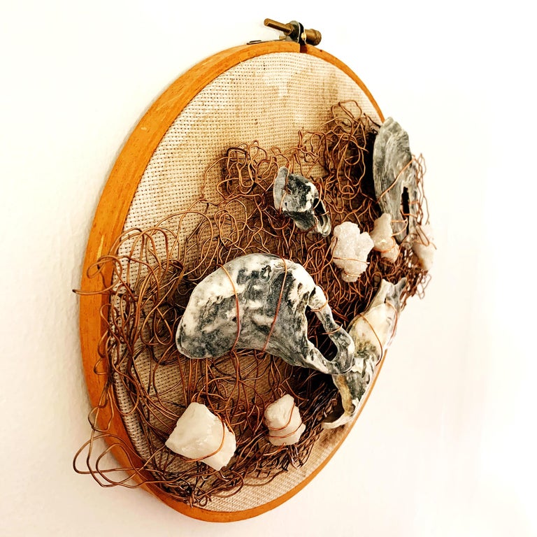 Sunsoak, 2020, wire embroidery, vintage bamboo hoop, oyster shells, earth tones.  An innovative sculptural embroidery work by Jacie Jane with major beach vibes. Four beautiful, sunsoaked oyster shells and five sparkling faux quartz gemstones are
