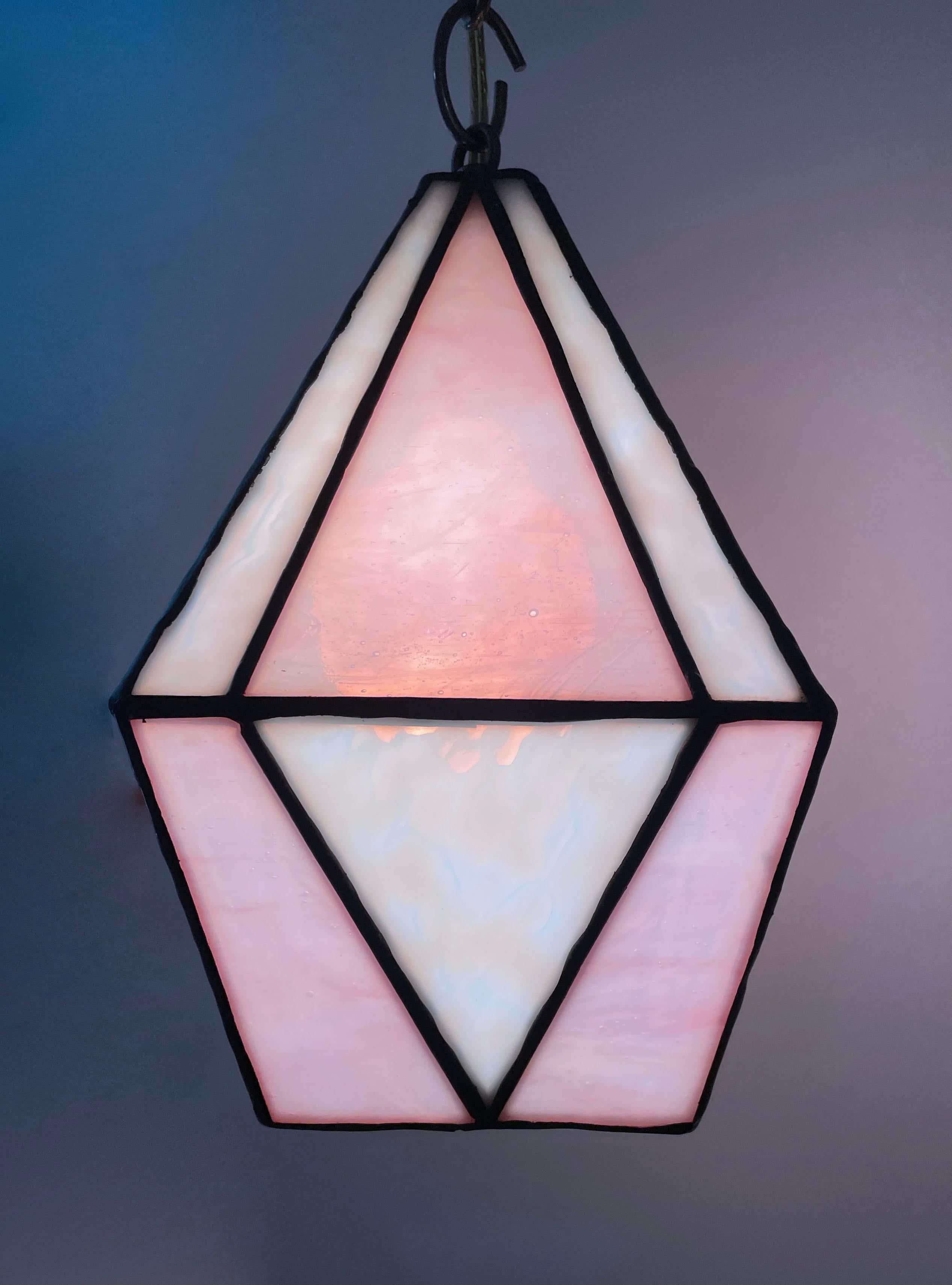 Handcrafted stained glass ceiling lamp with brass hardware, decorators chain and 8ft wall plug with toggle switch. Pink streaky and white ring mottled glass. Ready to hang.  Multiples available but each one is slightly unique by the hand made