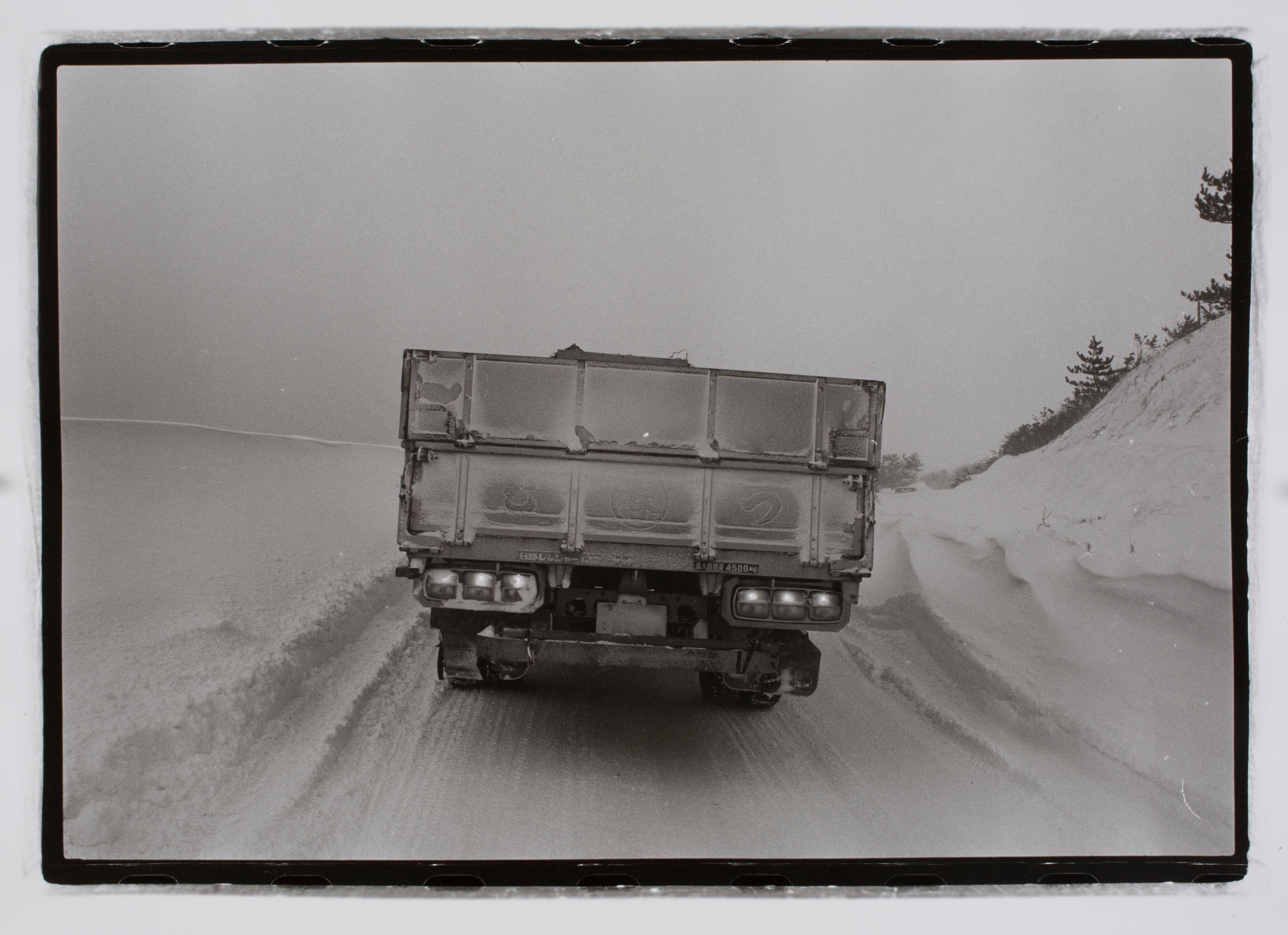 Hideoki Hagiwara Black and White Photograph - Hideoki, Black & White, Photography, Truck on Snowy Road, Japan, 1978, 16" x 20"