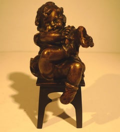 Antique "A Girl Sitting on a Stool Tying Her Shoe", 20th Century Bronze by Juan Clará