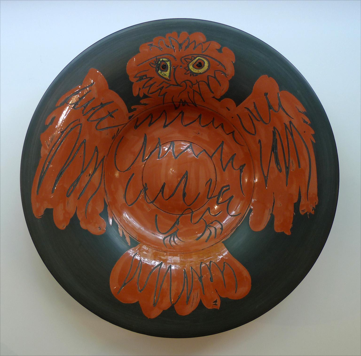 PABLO PICASSO (1881-1973)
Hibou rouge sur fond noir (A.R. 399)
stamped, marked and numbered 'Madoura Plein Feu / Edition Picasso / N 103 / Edition Picasso / 1/150 / Madoura' (underneath)
terracotta bowl, partially engraved, with colored engobe and