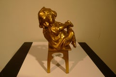 "A Girl Sitting on a Stool Tying Her Shoe", 20th Century Bronze by Juan Clará