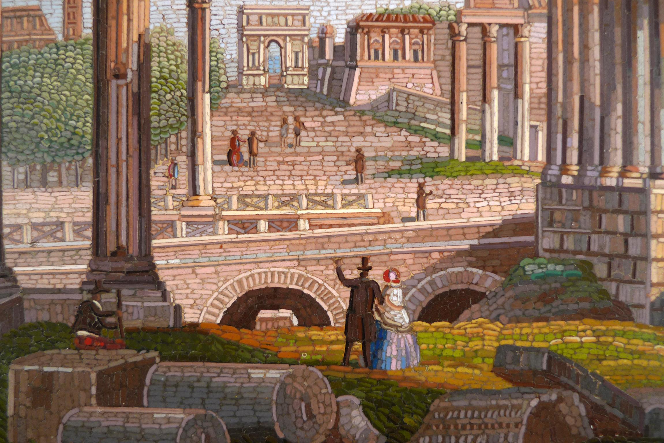 THE ROMAN FORUM
19th CENTURY ITALIAN MICROMOSAIC PLAQUE
Circa 1850
Mounted on an 18th Century  Carved and Gilt Wood Frame
8-1/2 X 10-7/8 inches (21.3 X 27.5 cm.)
framed: 14-1/4 X 16-3/4 (36X 42.5 cm.)

PROVENANCE
Private Spanish Collector,