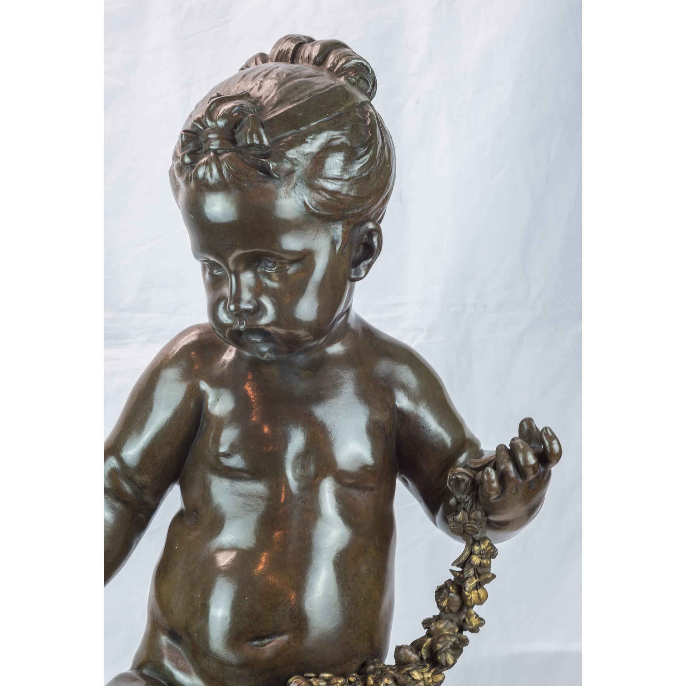 Pair of Figural Sculptures of Seated Cherubs For Sale 1