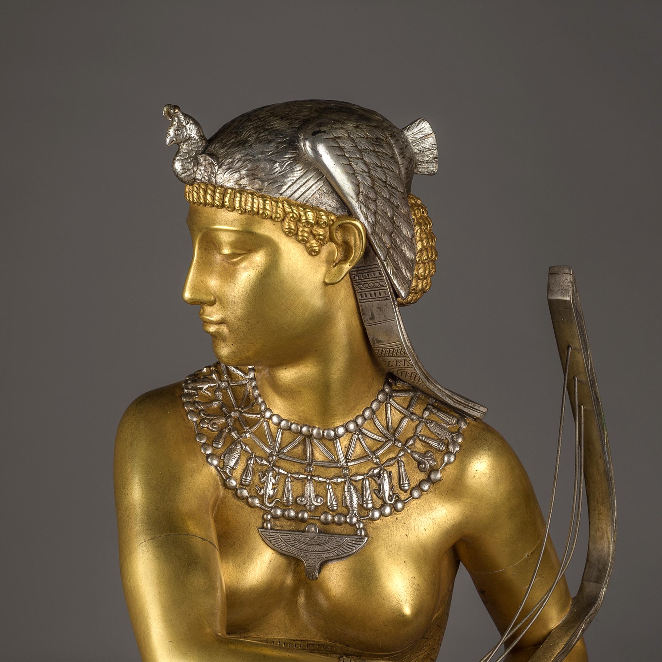 Escultura en bronce dorado de una bailarina egipcia de Falguiere 1