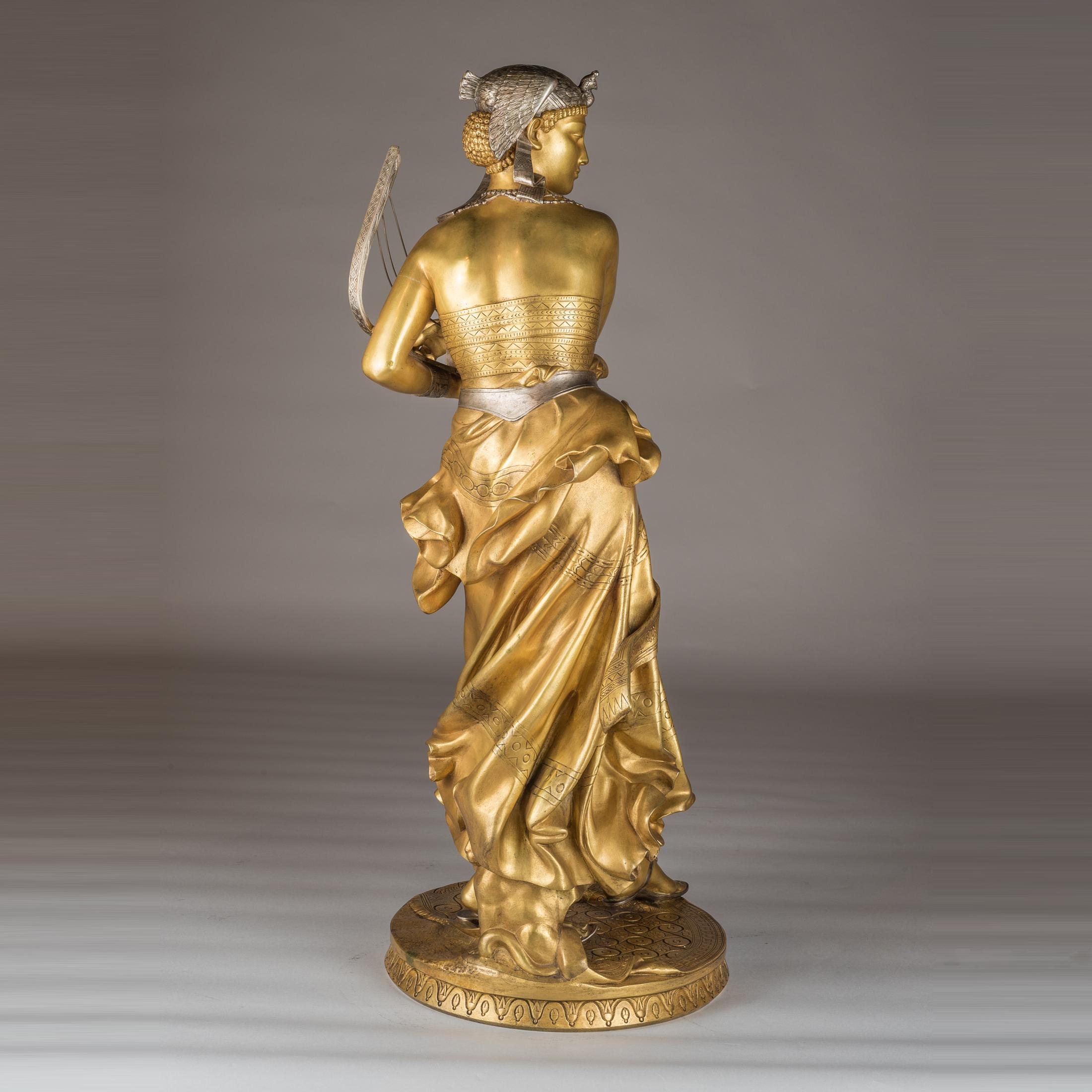 JEAN-JOSEPH ALEXANDRE FALGUIERE 
Francés, (1831-1900)

Bailarina egipcia 

Bronce dorado; Firmado 'A. Falguiere ' en la base; estampado G&S/Medaille D'Or 1867.
25 x 9 1/2 x 9 1/2 pulgadas