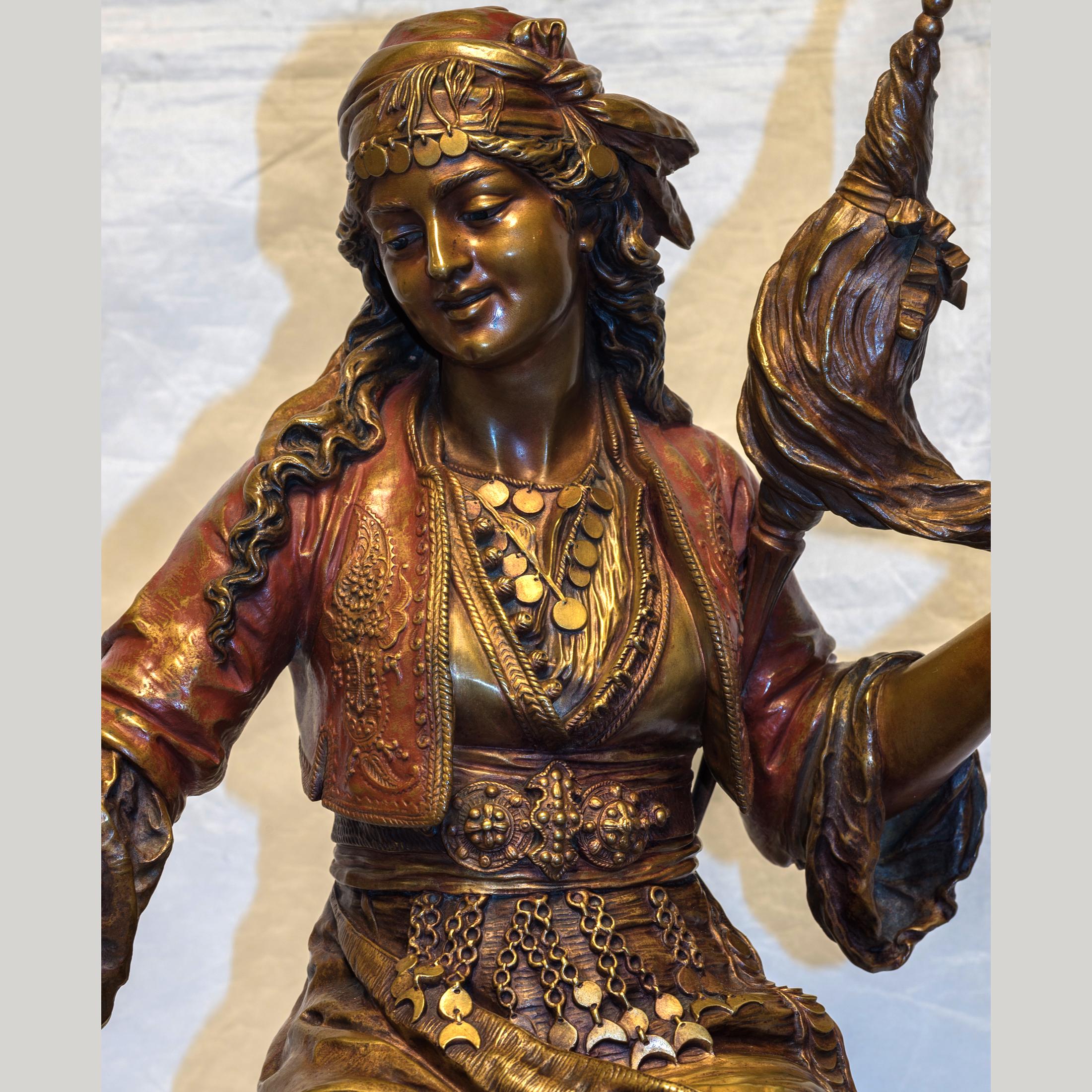 ÉMILE CORIOLAN HIPPOLYTE GUILLEMIN  
French, (1841-1907)

Pair of Female Gypsies       
    
Both signed ‘Ele Guillemin’.   
22 1/2 x 14 inches  

Notes:
A fine quality pair of polychrome bronze sculptures of a seated gypsy lady playing a lute and