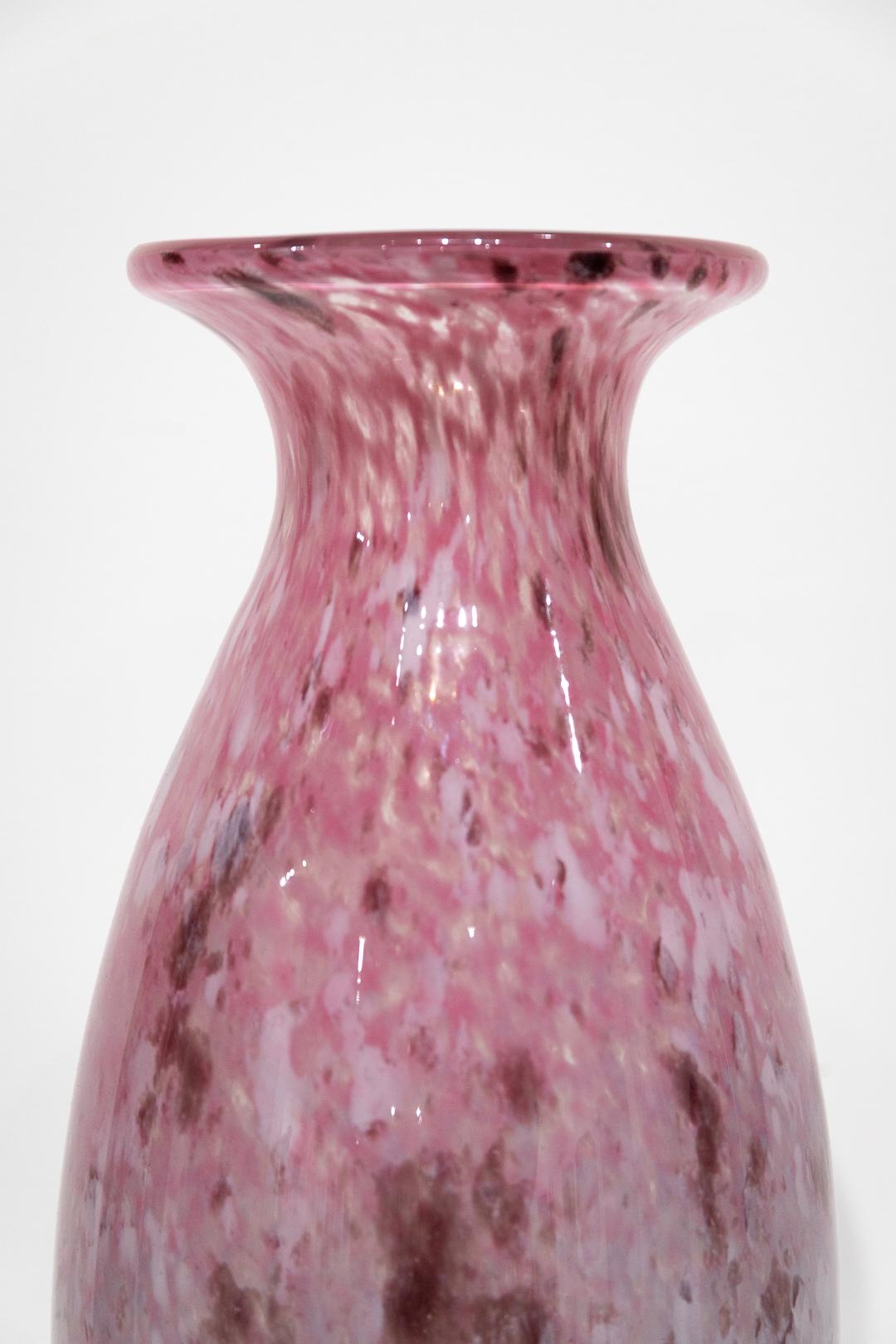 SALE ONE WEEK ONLY

This speckled and sparkling glass vase is an exemplary piece of the Art Nouveau period of France and was created by legendary glass-smith Charles Schneider. The pink and blue speckled and sparkling vase makes it an excellent